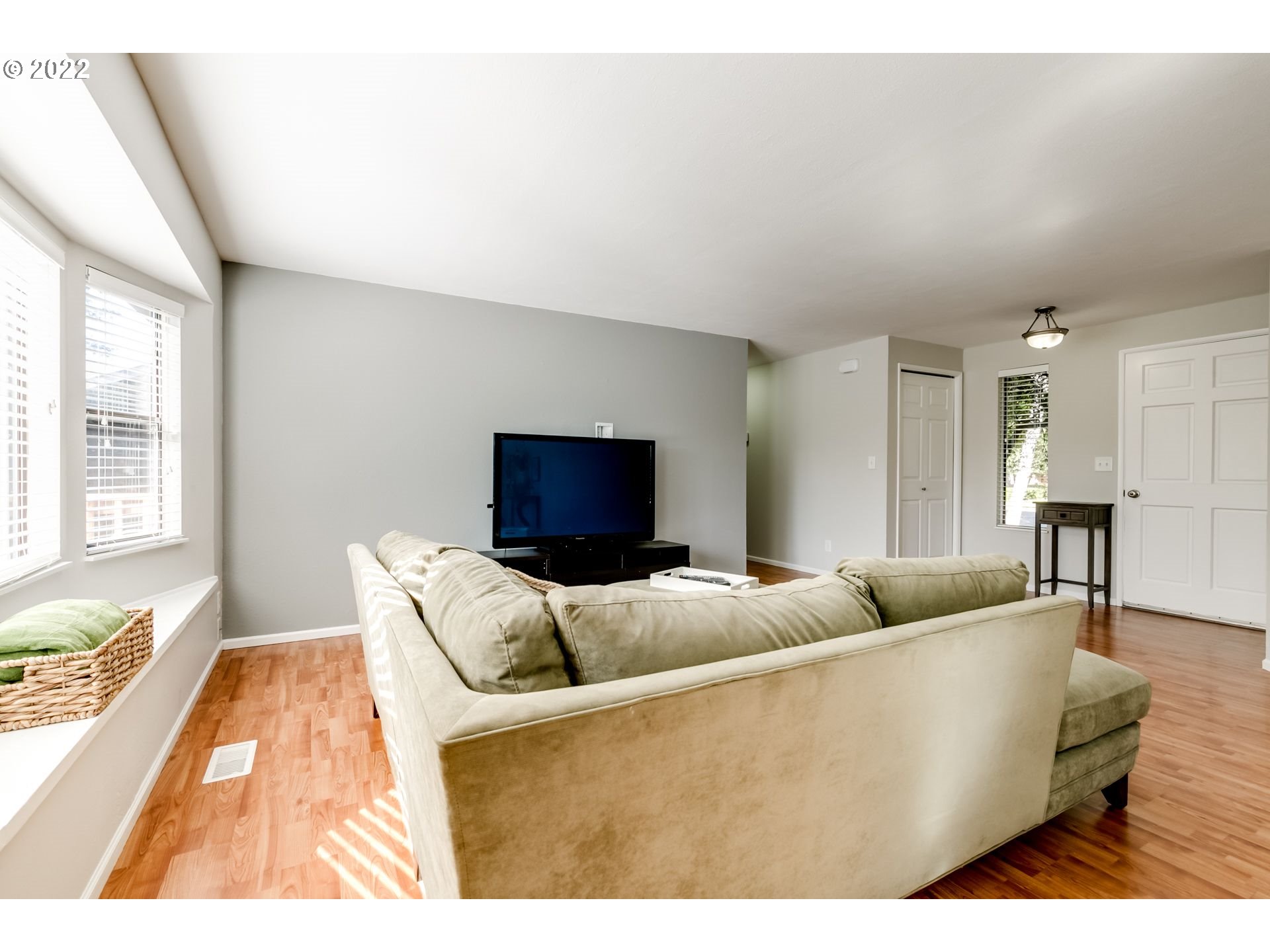 610 67th Place Springfield, OR 97478 - Photo 11 of 28 a living room with furniture and a flat screen tv