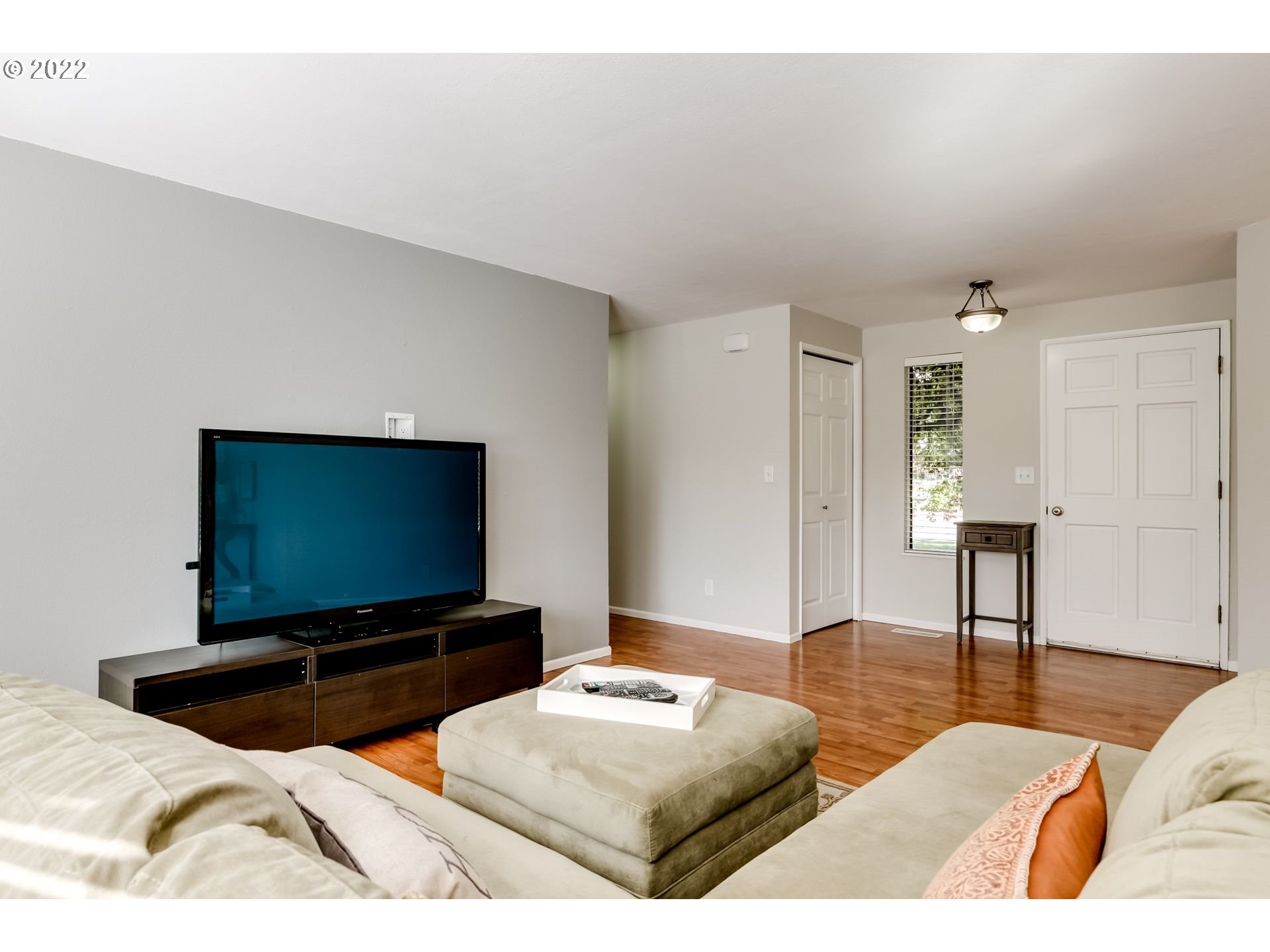610 67th Place Springfield, OR 97478 - Photo 12 of 28 a living room with furniture and a flat screen tv