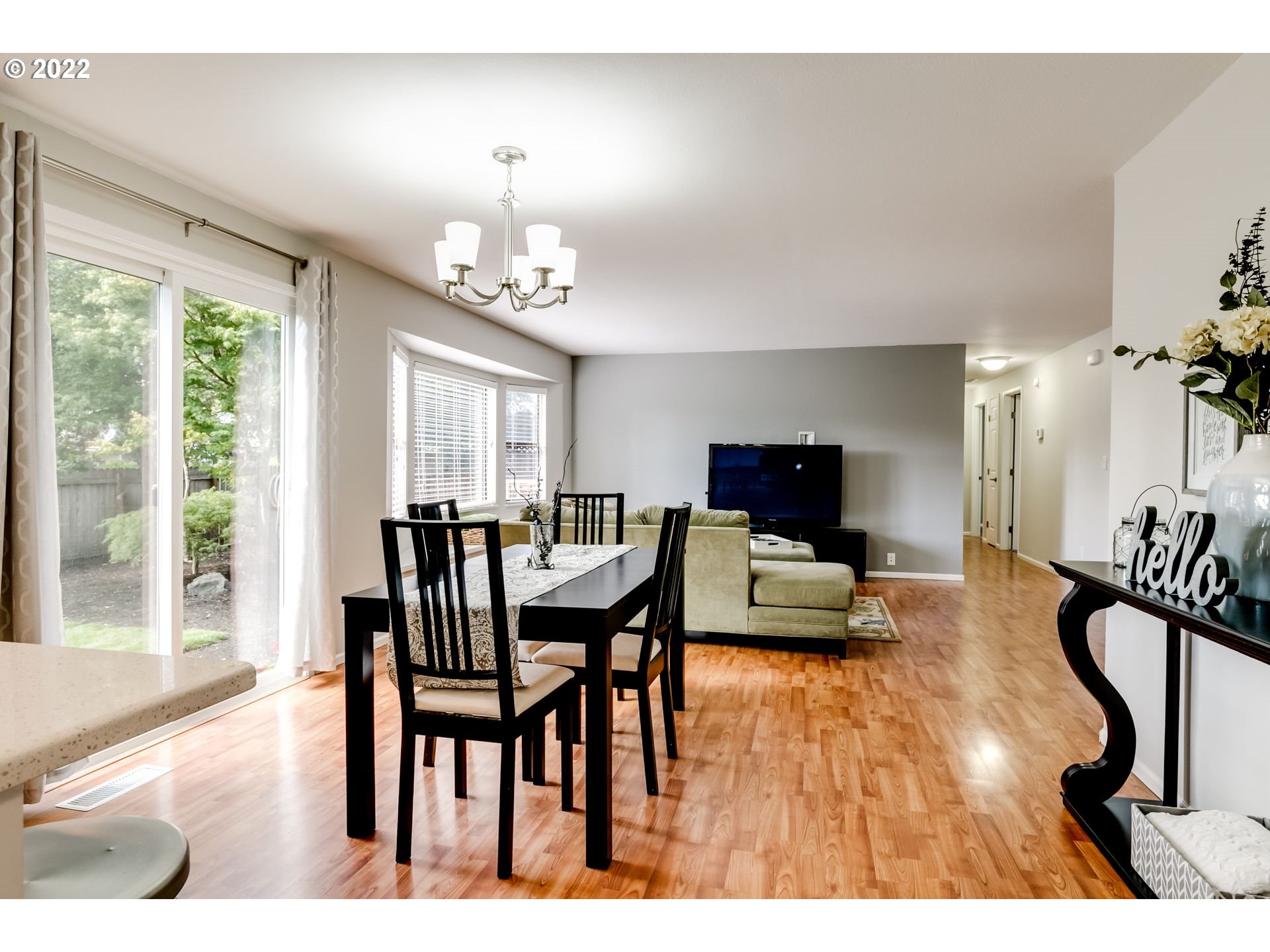 610 67th Place Springfield, OR 97478 - Photo 16 of 28 a view of a dining room with furniture window and wooden floor