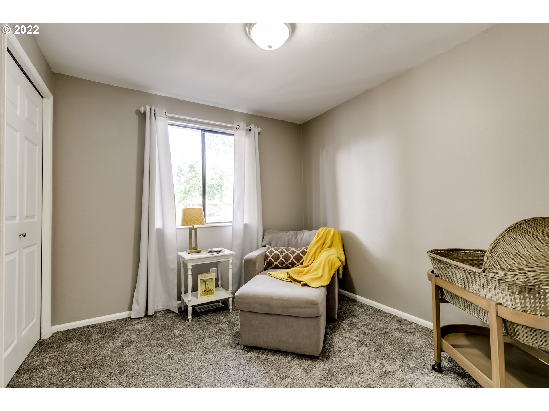 610 67th Place Springfield, OR 97478 - Photo 18 of 28 a living room with furniture and a window