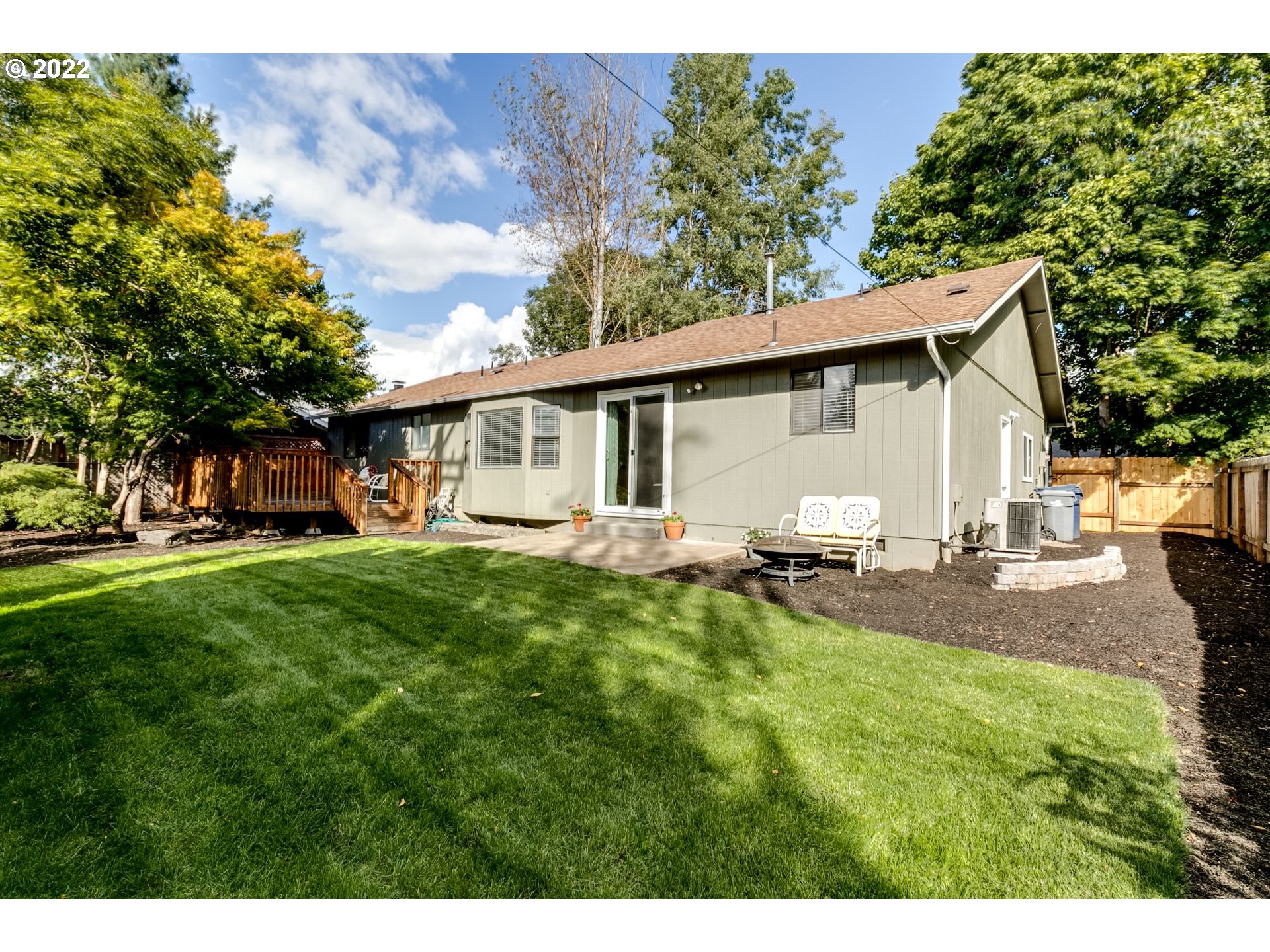610 67th Place Springfield, OR 97478 - Photo 27 of 28 a view of a house with backyard