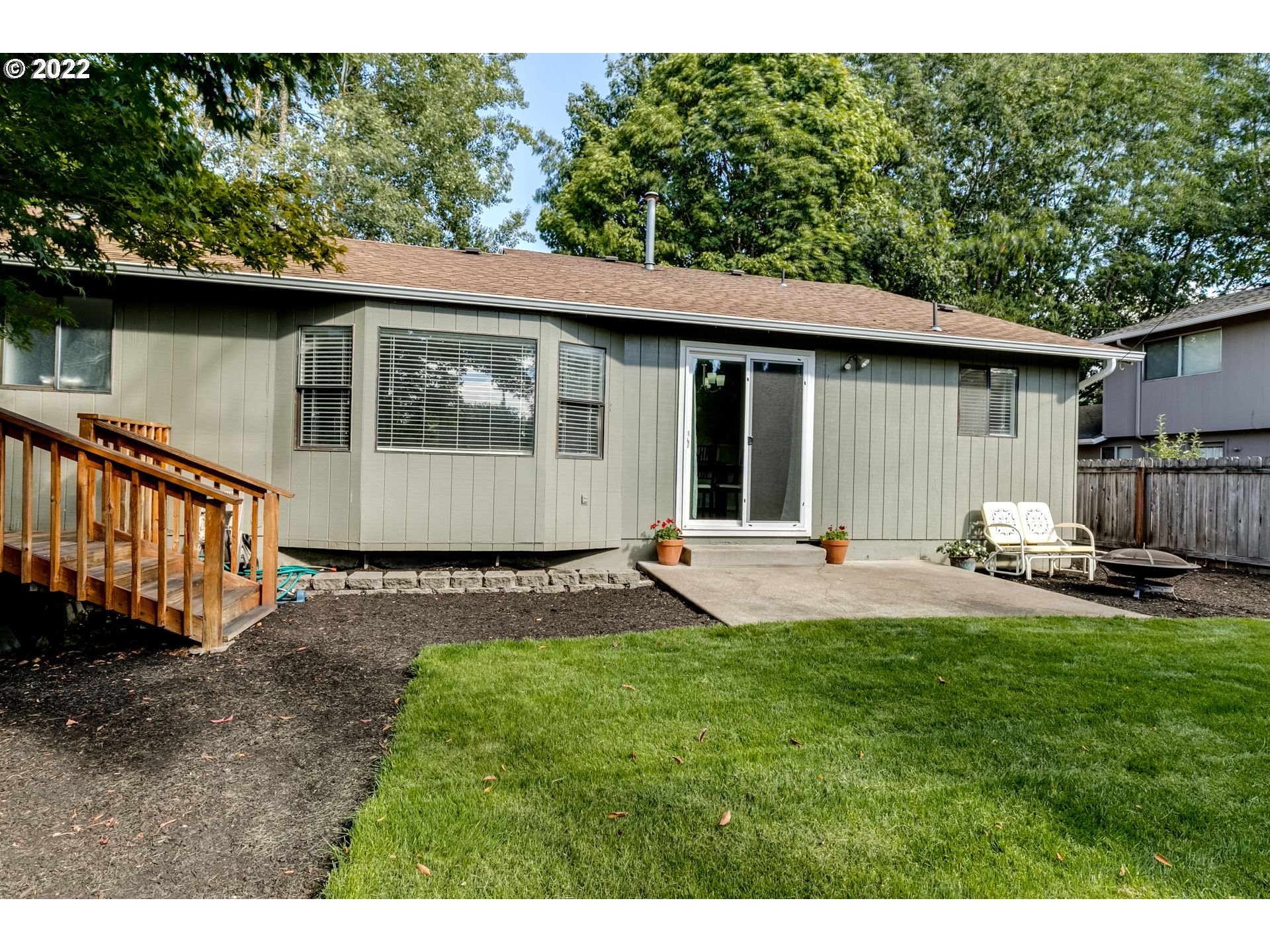 610 67th Place Springfield, OR 97478 - Photo 28 of 28 a view of a house with backyard and sitting area