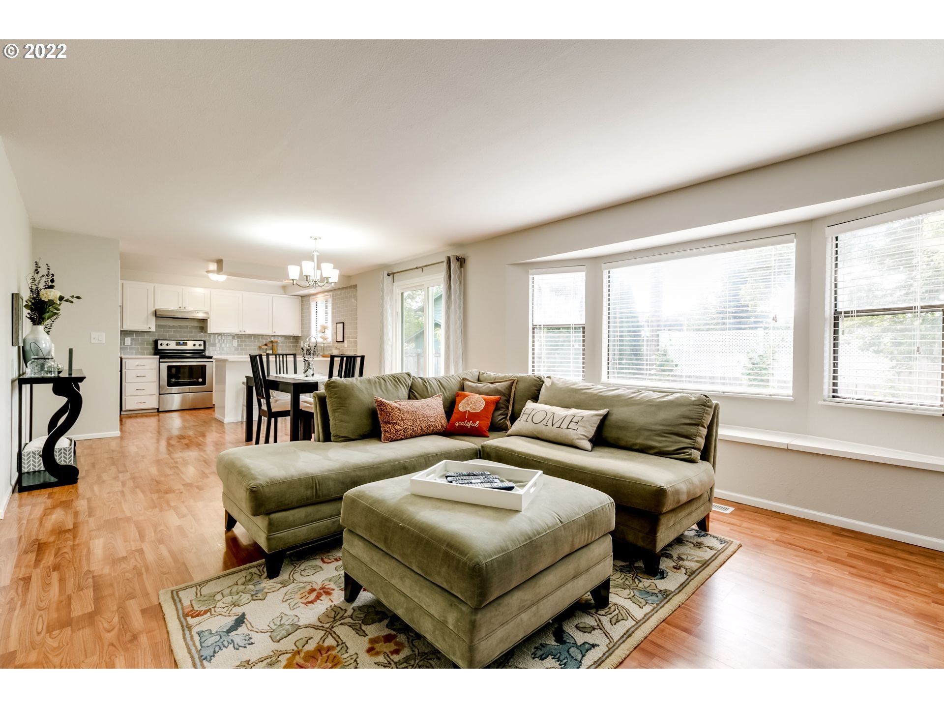 610 67th Place Springfield, OR 97478 - Photo 8 of 28 a living room with furniture and a large window
