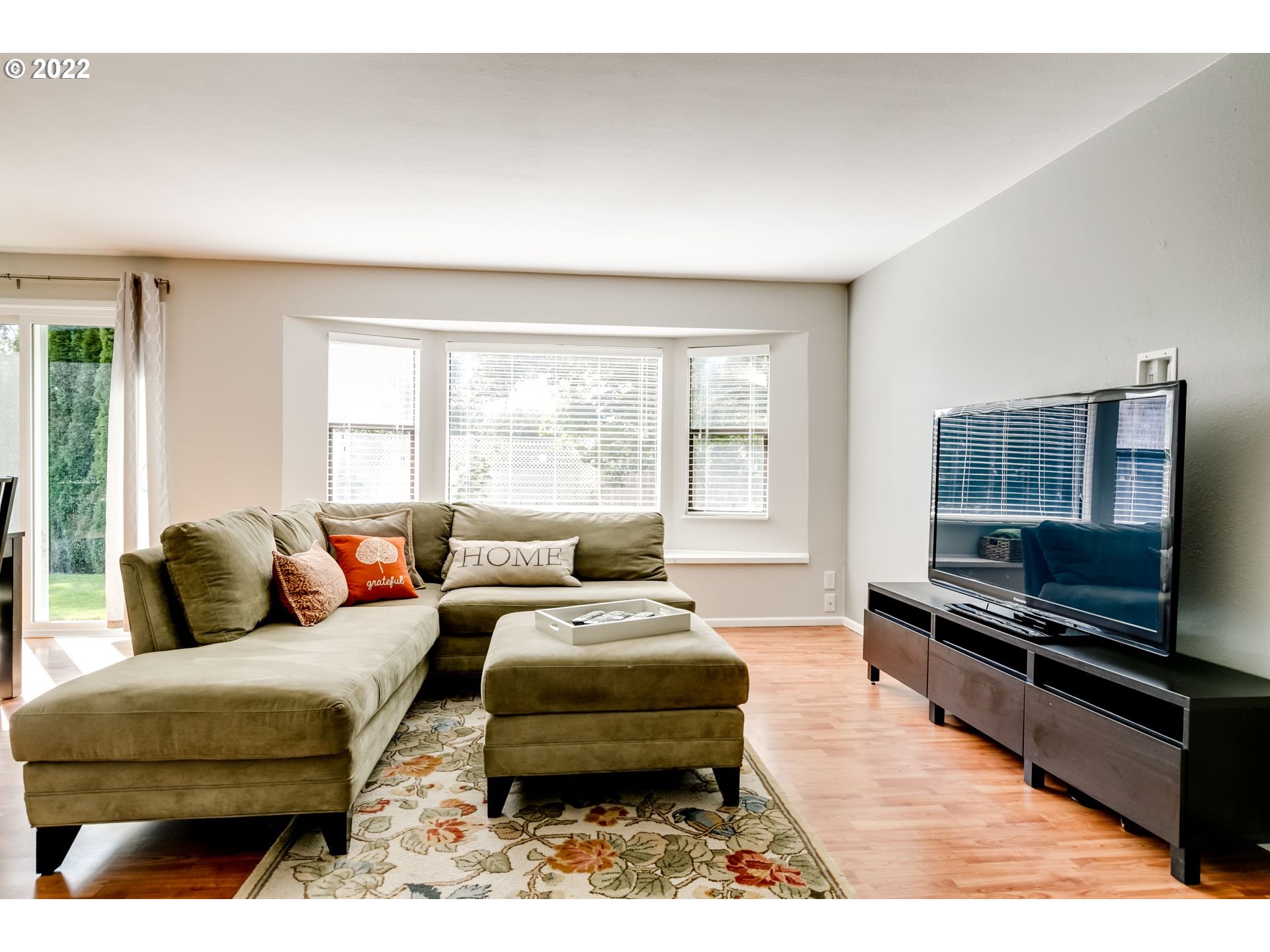 610 67th Place Springfield, OR 97478 - Photo 10 of 28 a living room with furniture and a large window