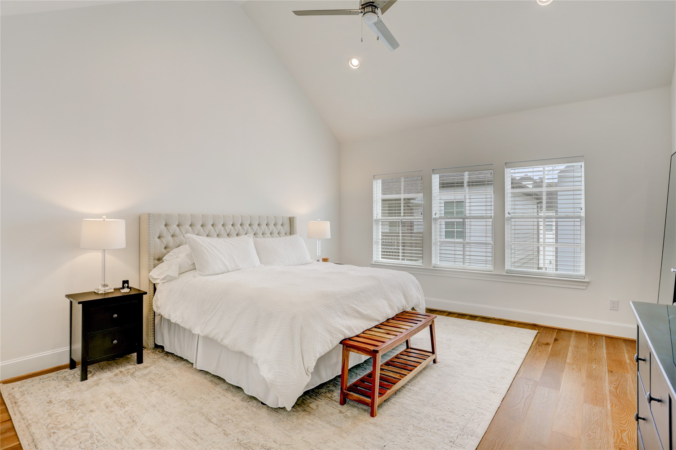 630 Delmar Street Houston, TX 77023 - Photo 14 of 27 a bed sitting in a bedroom next to a window