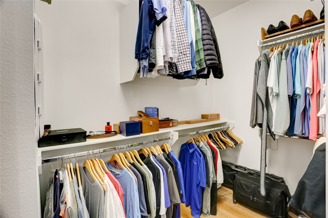 630 Delmar Street Houston, TX 77023 - Photo 19 of 27 a view of walk in closet with clothes and shoes