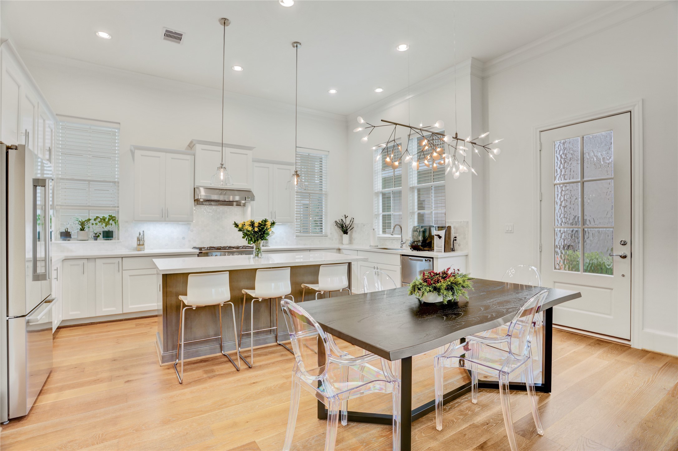 630 Delmar Street Houston, TX 77023 - Photo 5 of 27 a view of a dining room with furniture and wooden floor
