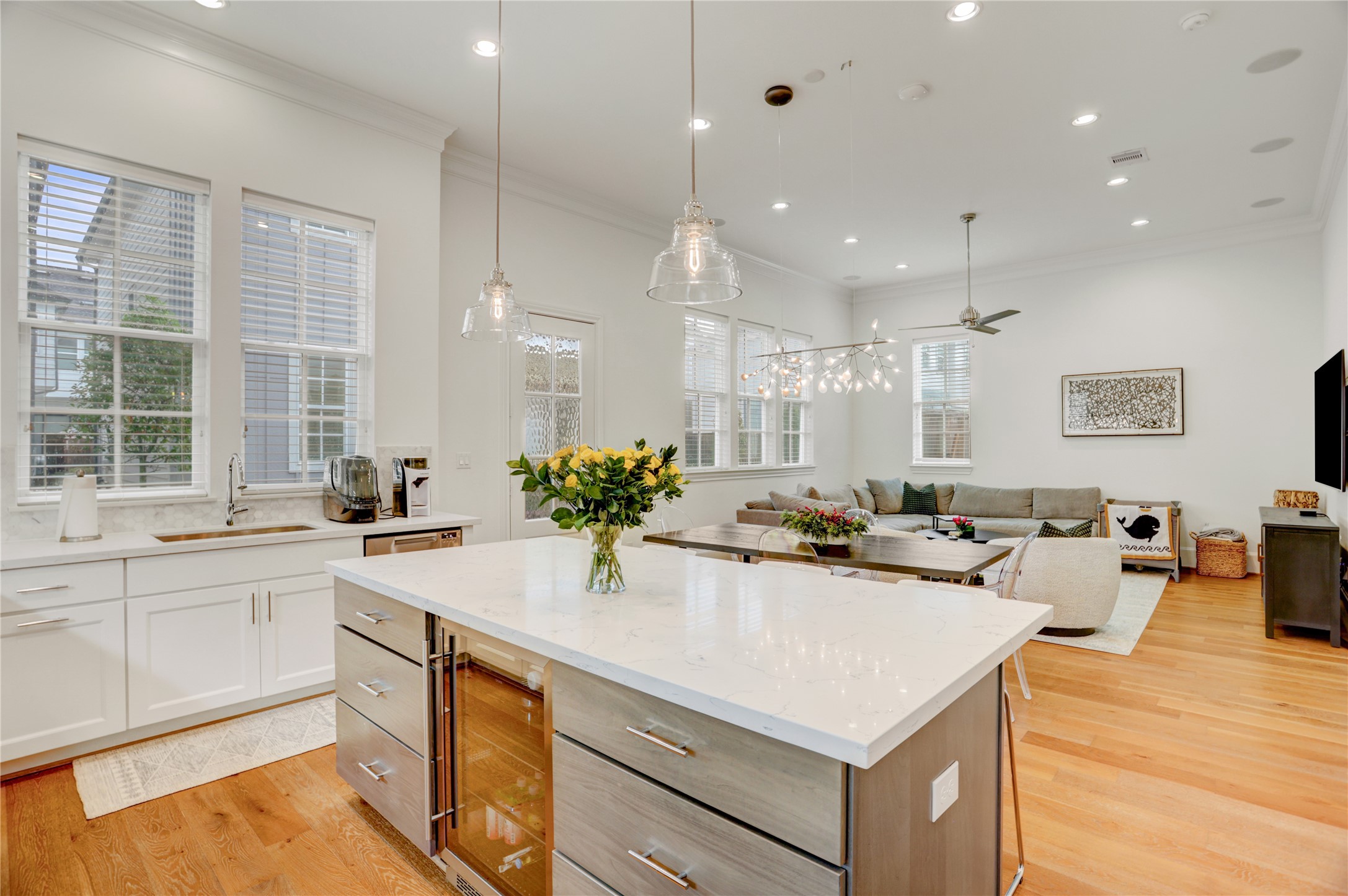 630 Delmar Street Houston, TX 77023 - Photo 7 of 27 a kitchen that has a lot of cabinets a sink and a stove in it
