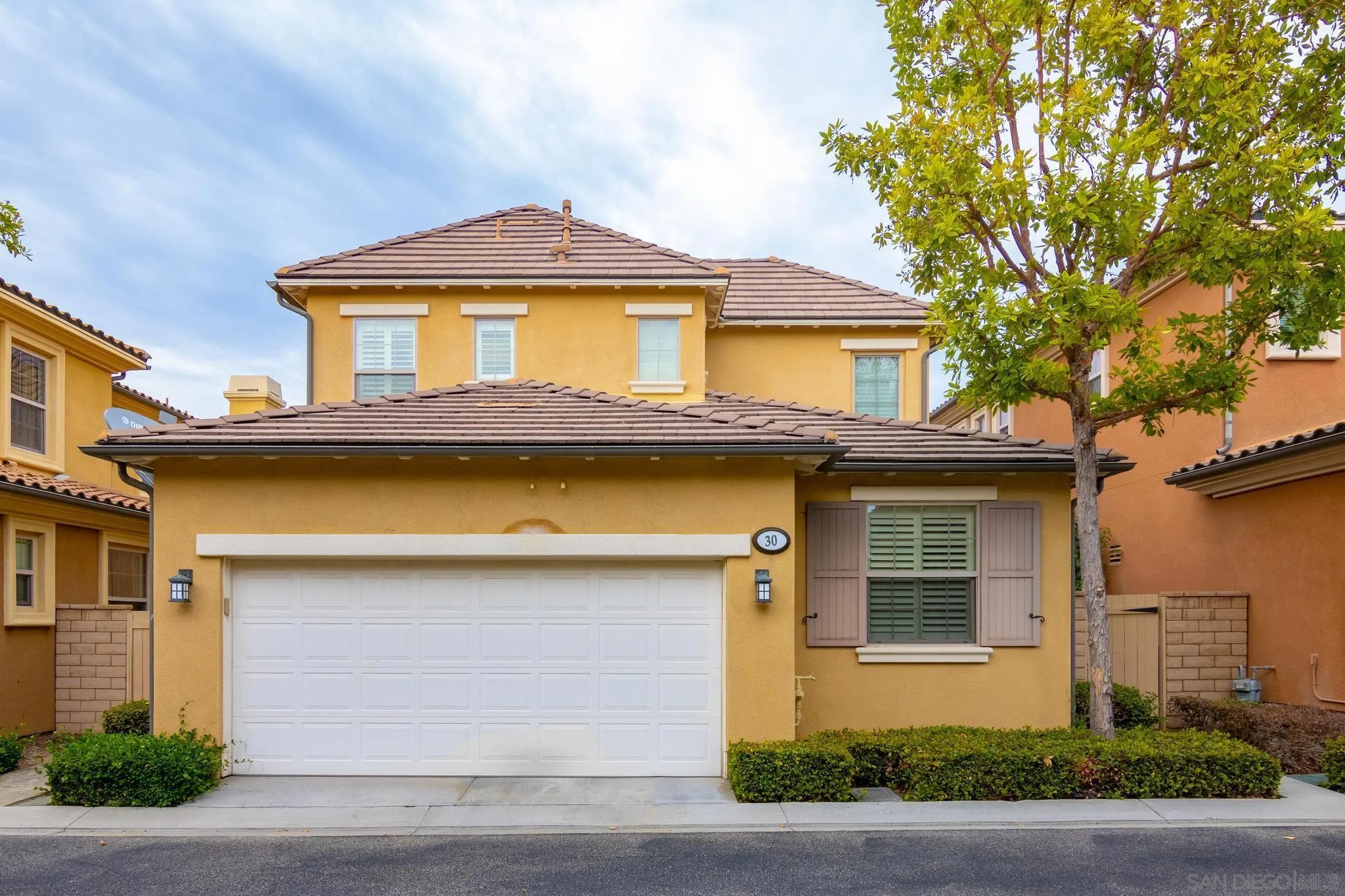 30 Long Fellow Irvine, CA 92620 - Photo 15 of 43 a front view of a house with yard