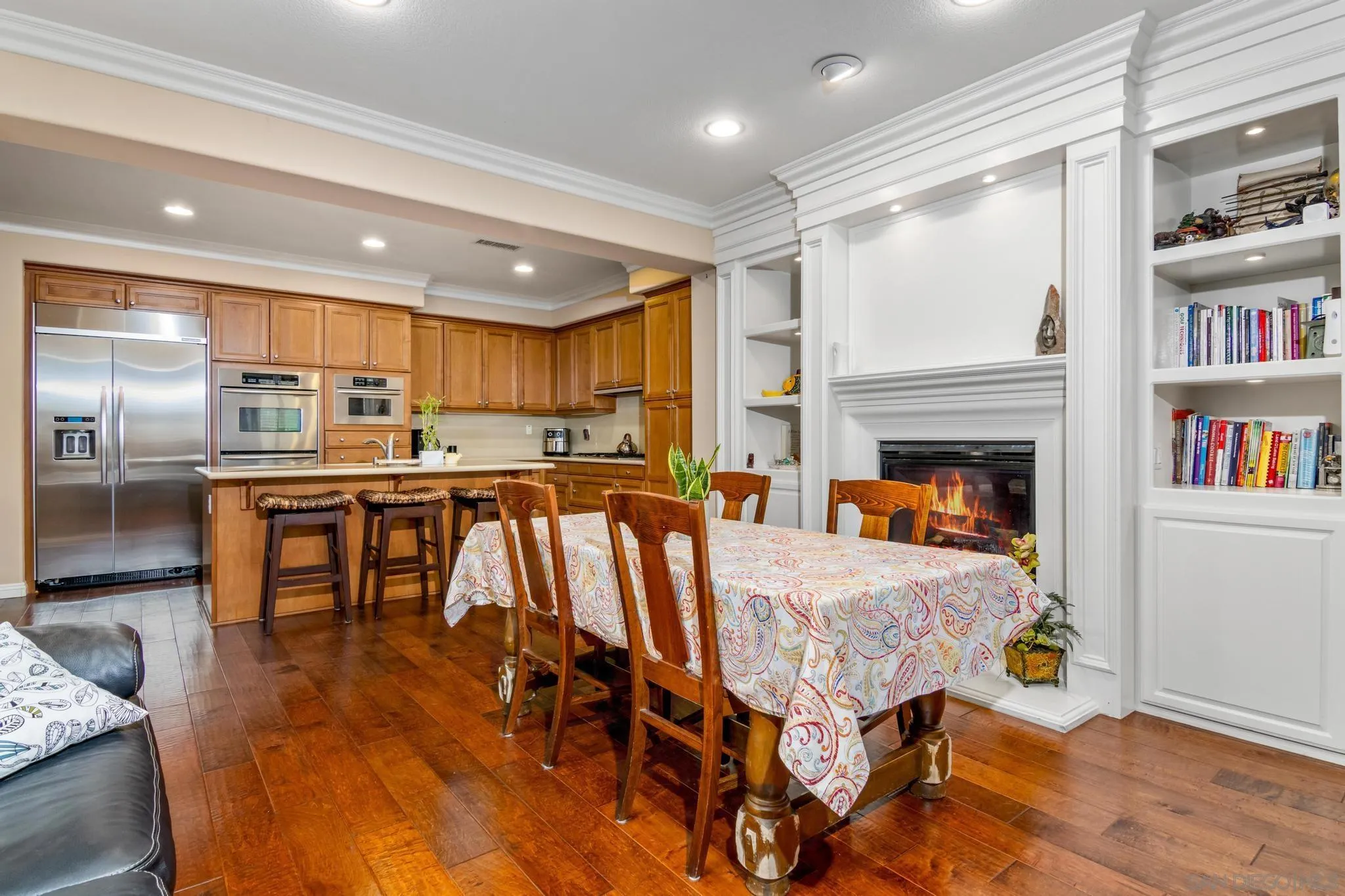 30 Long Fellow Irvine, CA 92620 - Photo 21 of 43 a living room with furniture a flat screen tv and a table