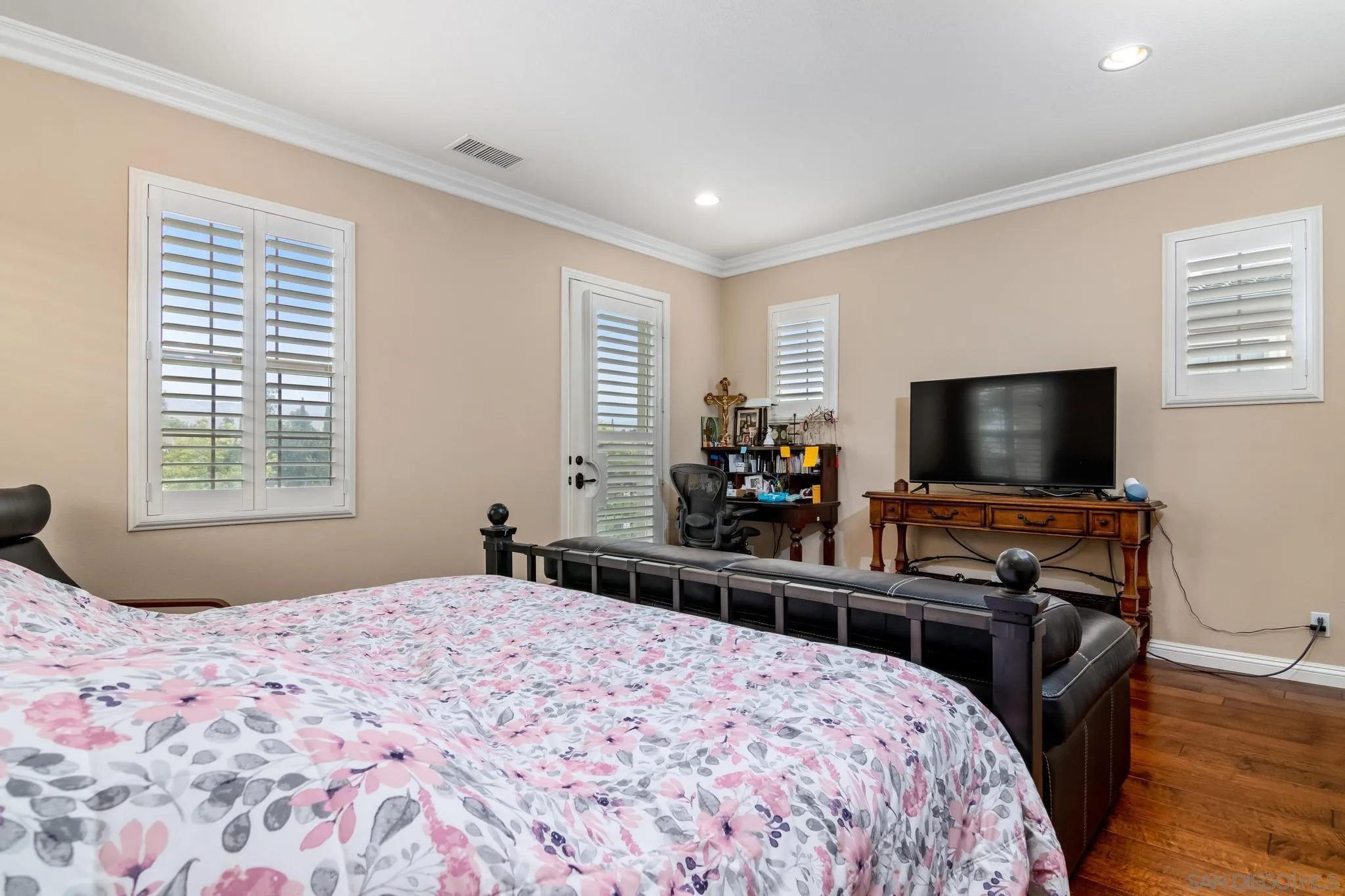 30 Long Fellow Irvine, CA 92620 - Photo 35 of 43 a bedroom with a bed and a flat screen tv