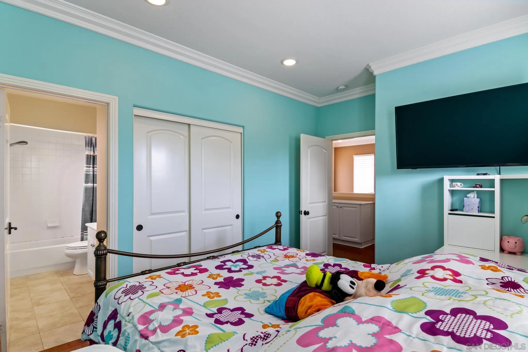 30 Long Fellow Irvine, CA 92620 - Photo 37 of 43 a bedroom with a bed and a flat screen tv