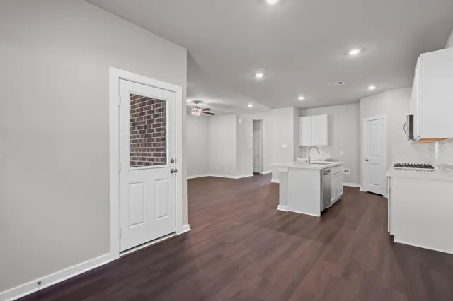 a view of kitchen with wooden floor