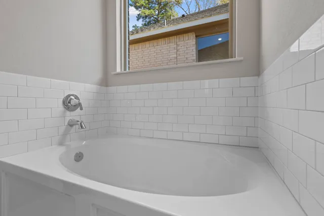 a bathroom with a bathtub