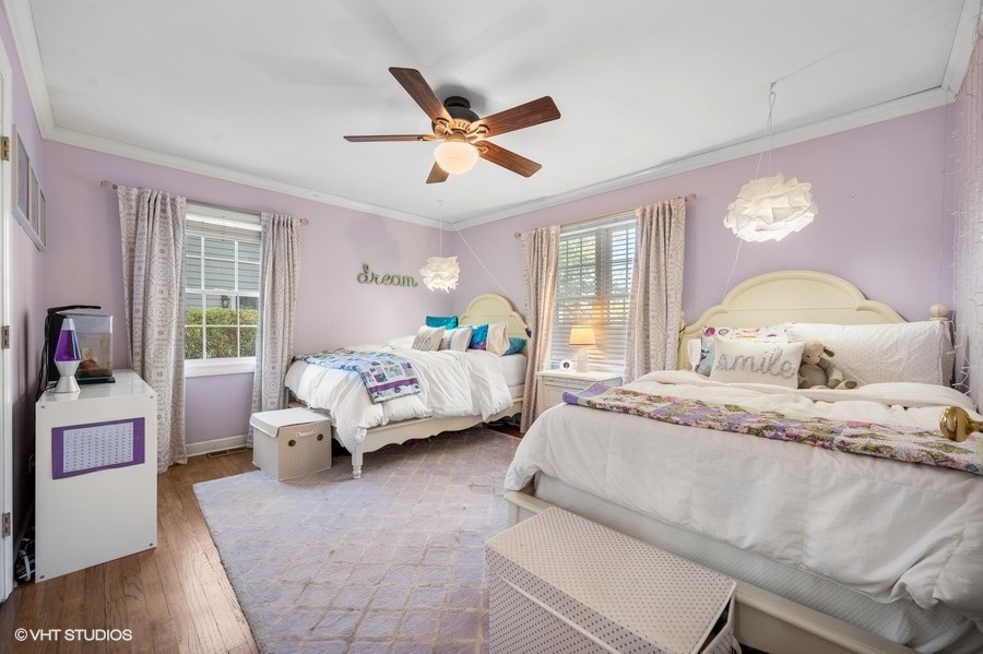 915 Golfview Road Glenview, IL 60025 - Photo 15 of 31 a bedroom with a bed and window