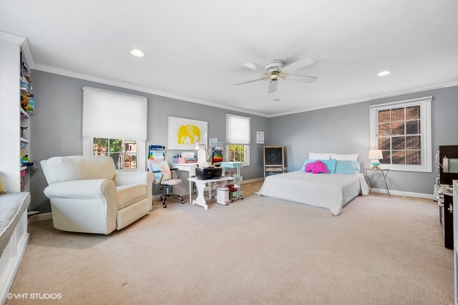 915 Golfview Road Glenview, IL 60025 - Photo 16 of 31 a living room with furniture and a window