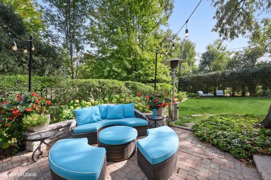 915 Golfview Road Glenview, IL 60025 - Photo 25 of 31 a view of a chair and table in the garden