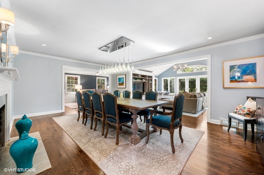 915 Golfview Road Glenview, IL 60025 - Photo 3 of 31 a view of a dining room with furniture window and wooden floor