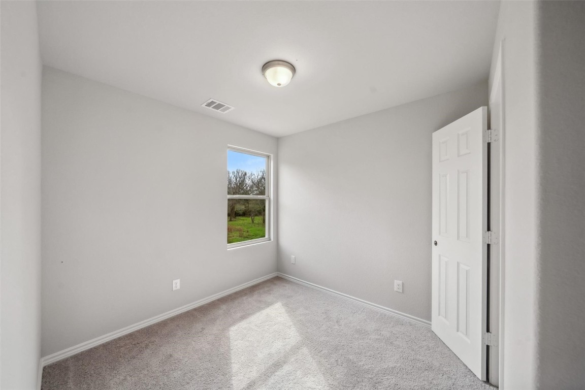515 16th Street Hempstead, TX 77445 - Photo 20 of 23 a view of an empty room with a window