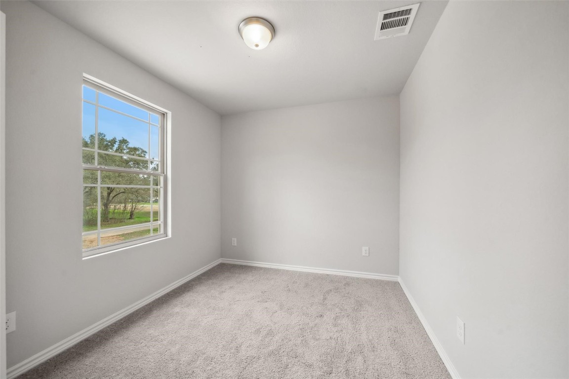 515 16th Street Hempstead, TX 77445 - Photo 21 of 23 an empty room with a window