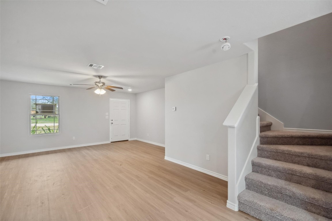 515 16th Street Hempstead, TX 77445 - Photo 8 of 23 wooden floor in an empty room with a window