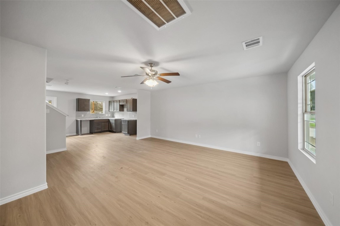 515 16th Street Hempstead, TX 77445 - Photo 9 of 23 a view of an empty room with a window and kitchen view