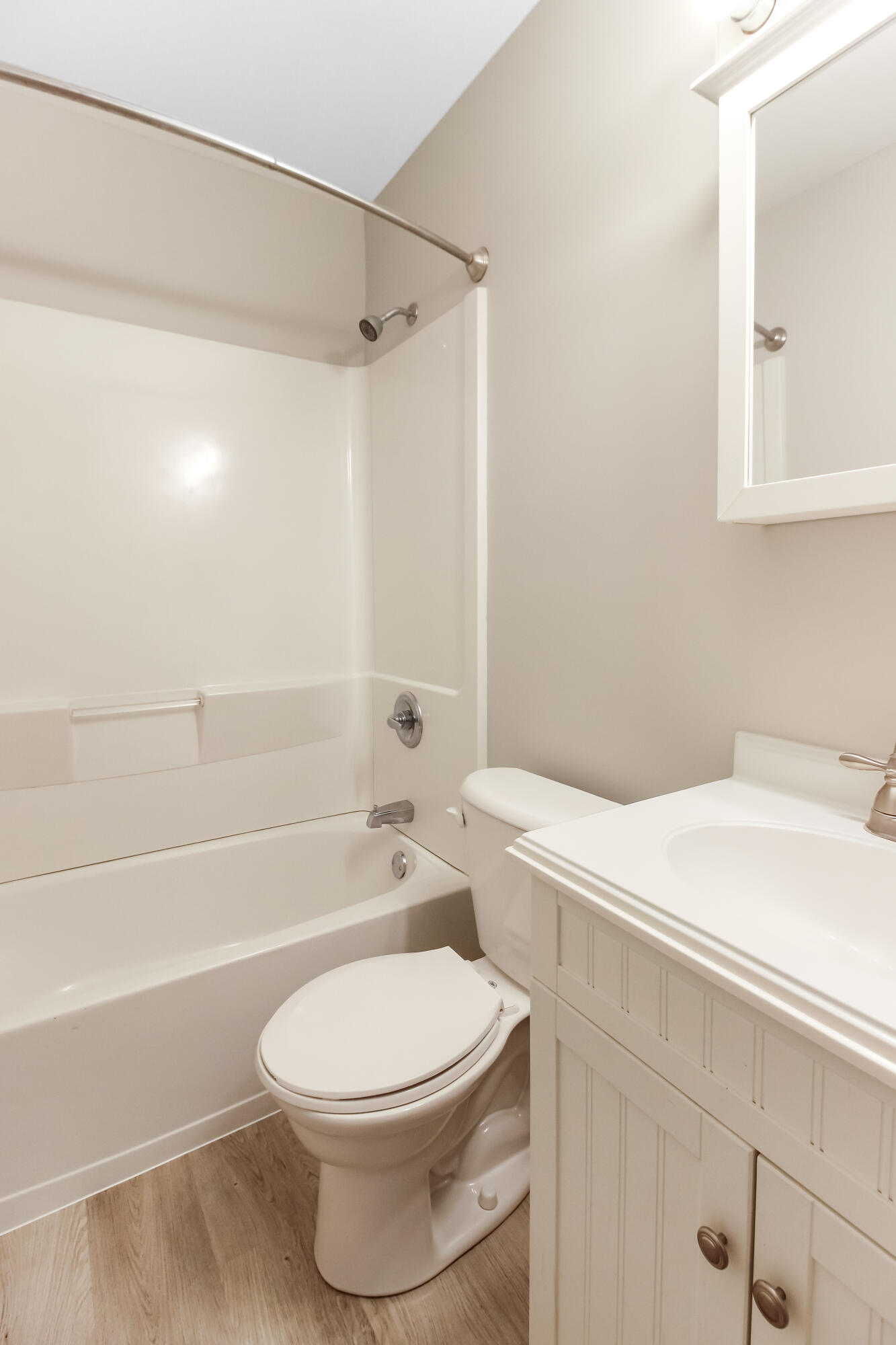 7348 West 83rd Place Crown Point, IN 46307 - Photo 13 of 14 a bathroom with a sink a toilet and shower