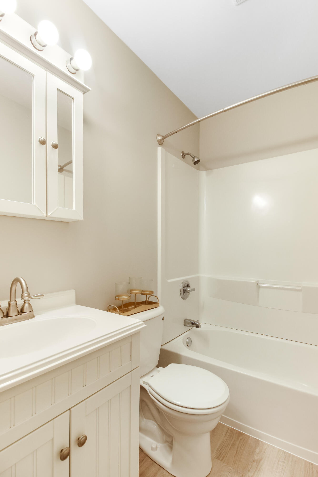 7348 West 83rd Place Crown Point, IN 46307 - Photo 8 of 14 a bathroom with a sink a toilet and a bathtub