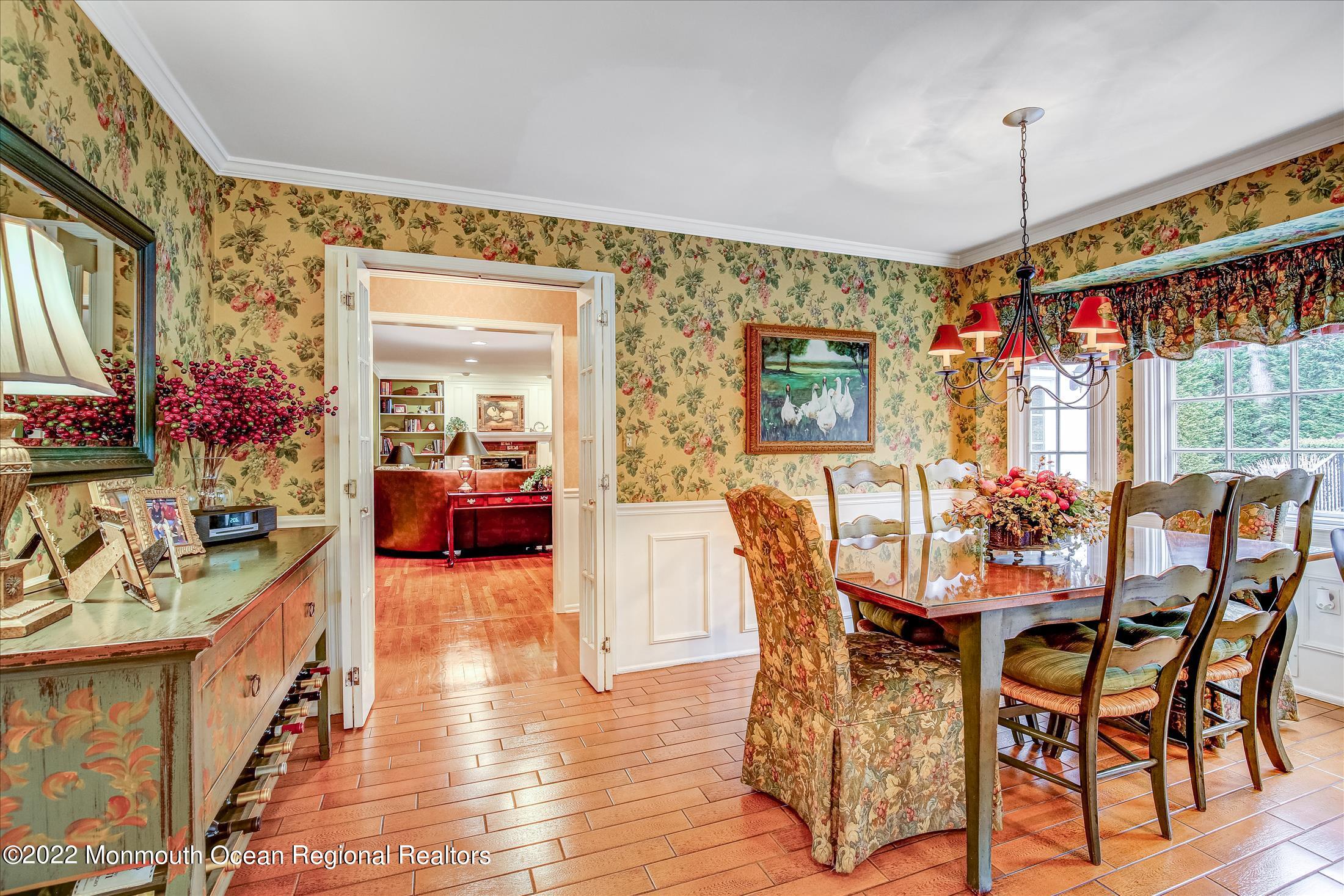 45 Ruby Drive Morganville, NJ 07751 - Photo 14 of 47 a dining room with furniture window and wooden floor