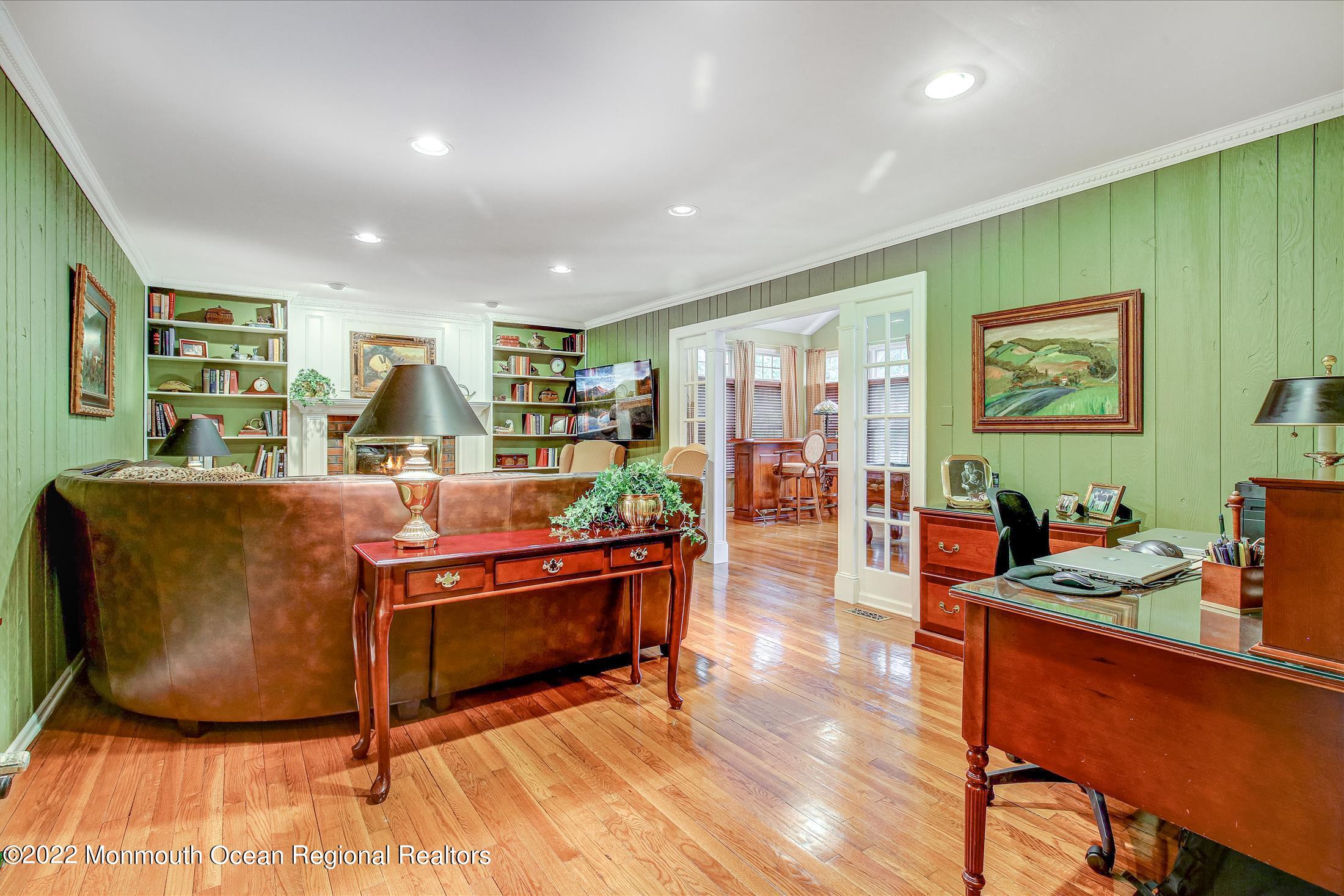 45 Ruby Drive Morganville, NJ 07751 - Photo 20 of 47 a living room with furniture and a wooden floor