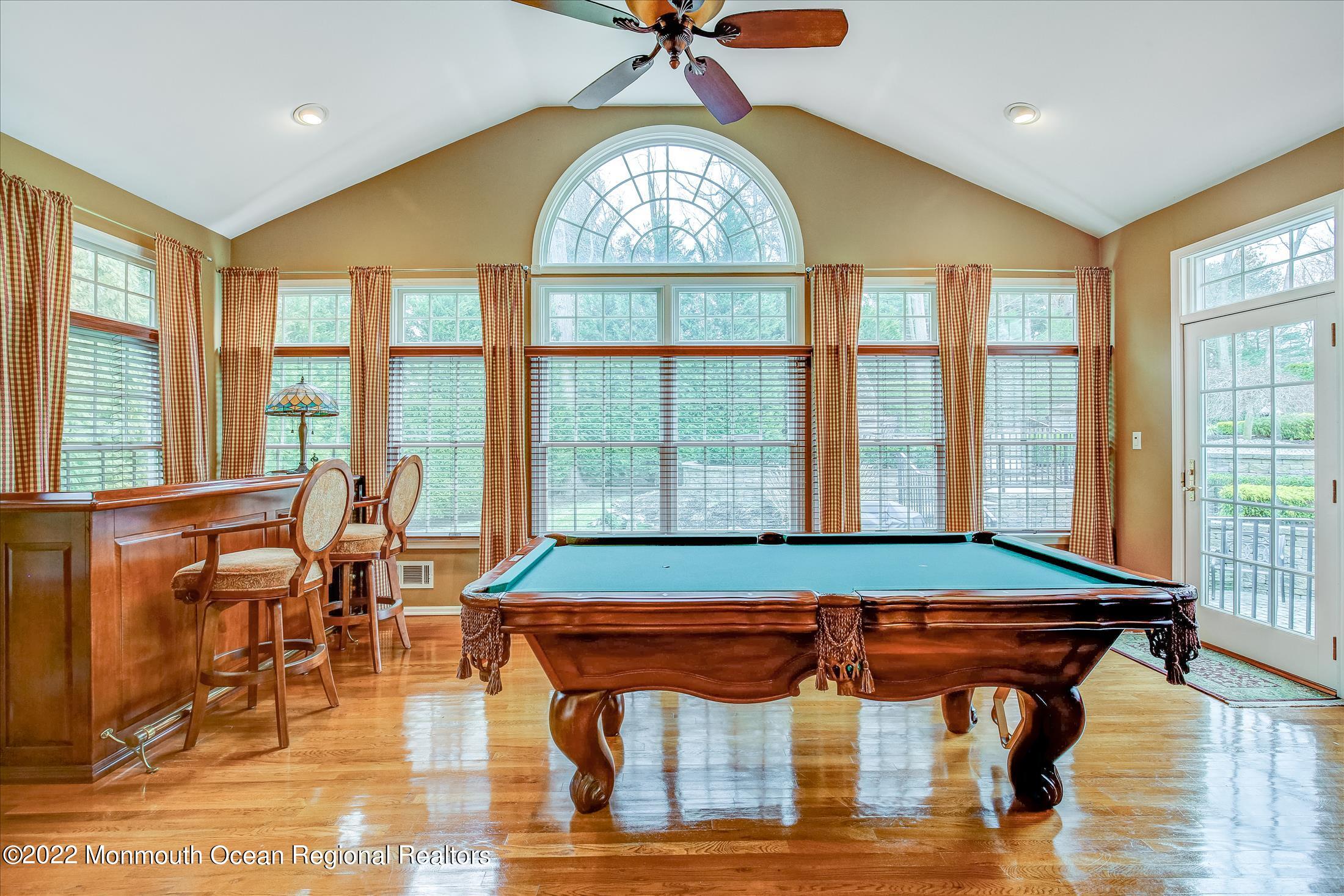 45 Ruby Drive Morganville, NJ 07751 - Photo 22 of 47 a room with pool table and windows