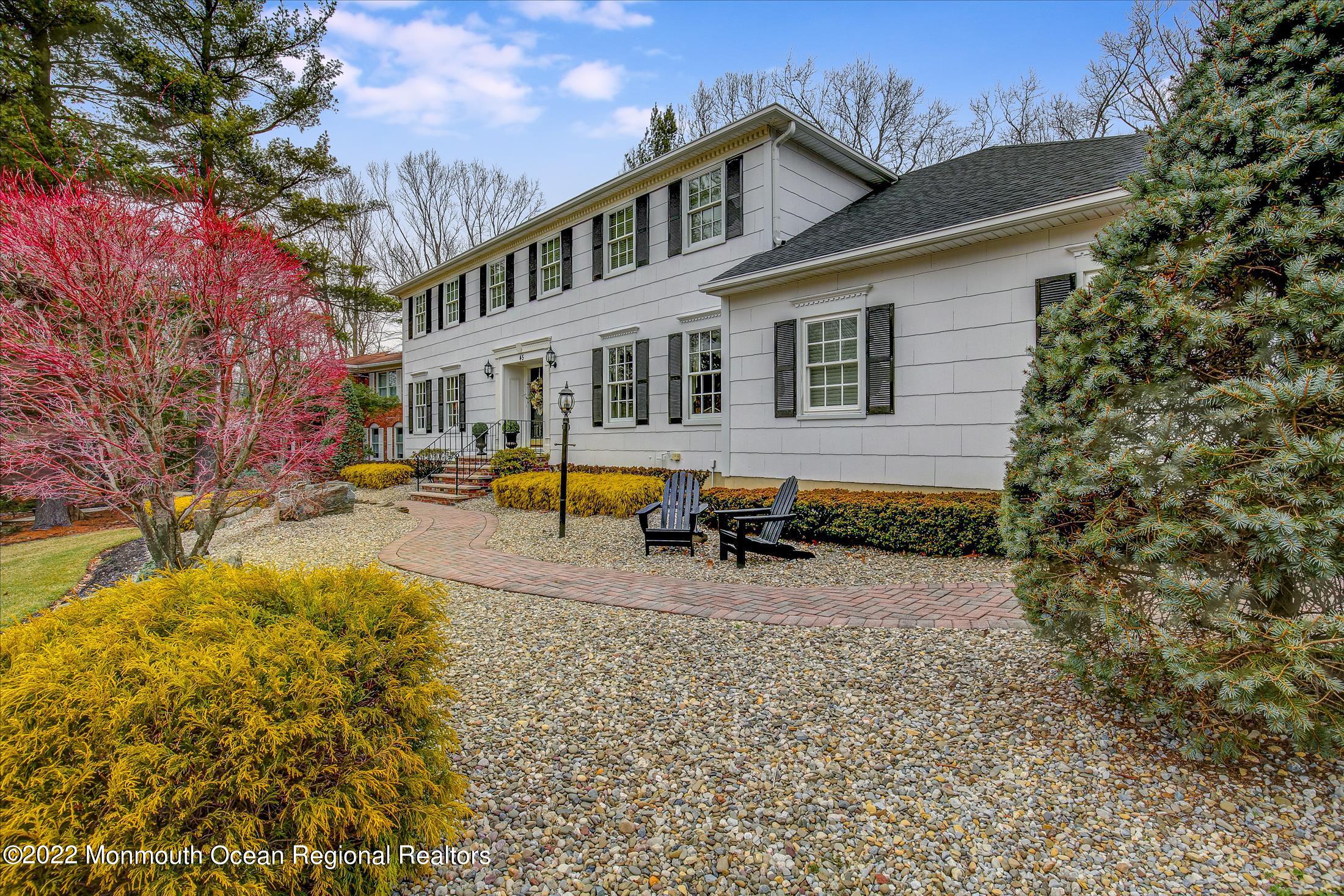 45 Ruby Drive Morganville, NJ 07751 - Photo 3 of 47 a view of a house with snow on the roof