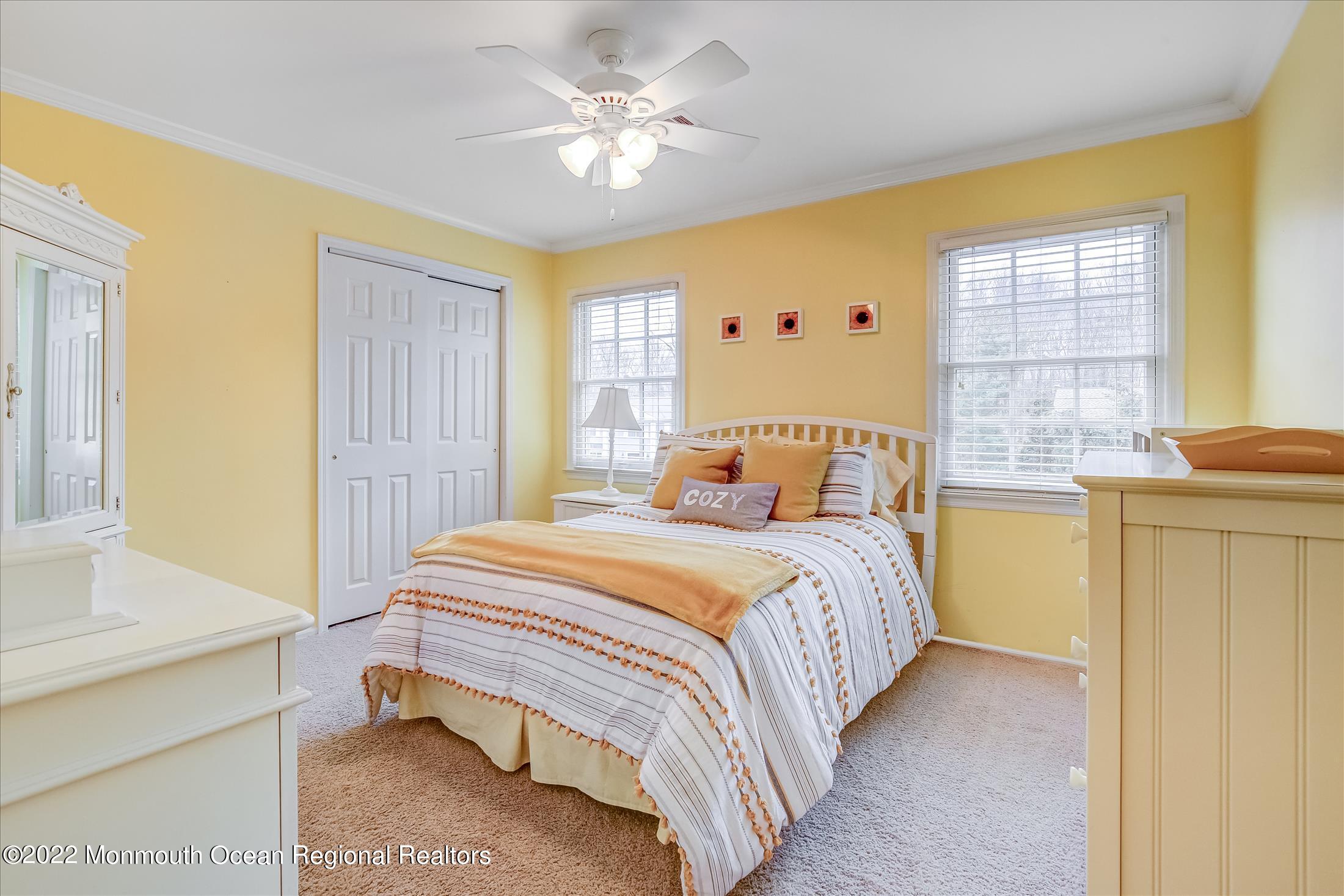 45 Ruby Drive Morganville, NJ 07751 - Photo 34 of 47 a bedroom with a bed dresser and a window