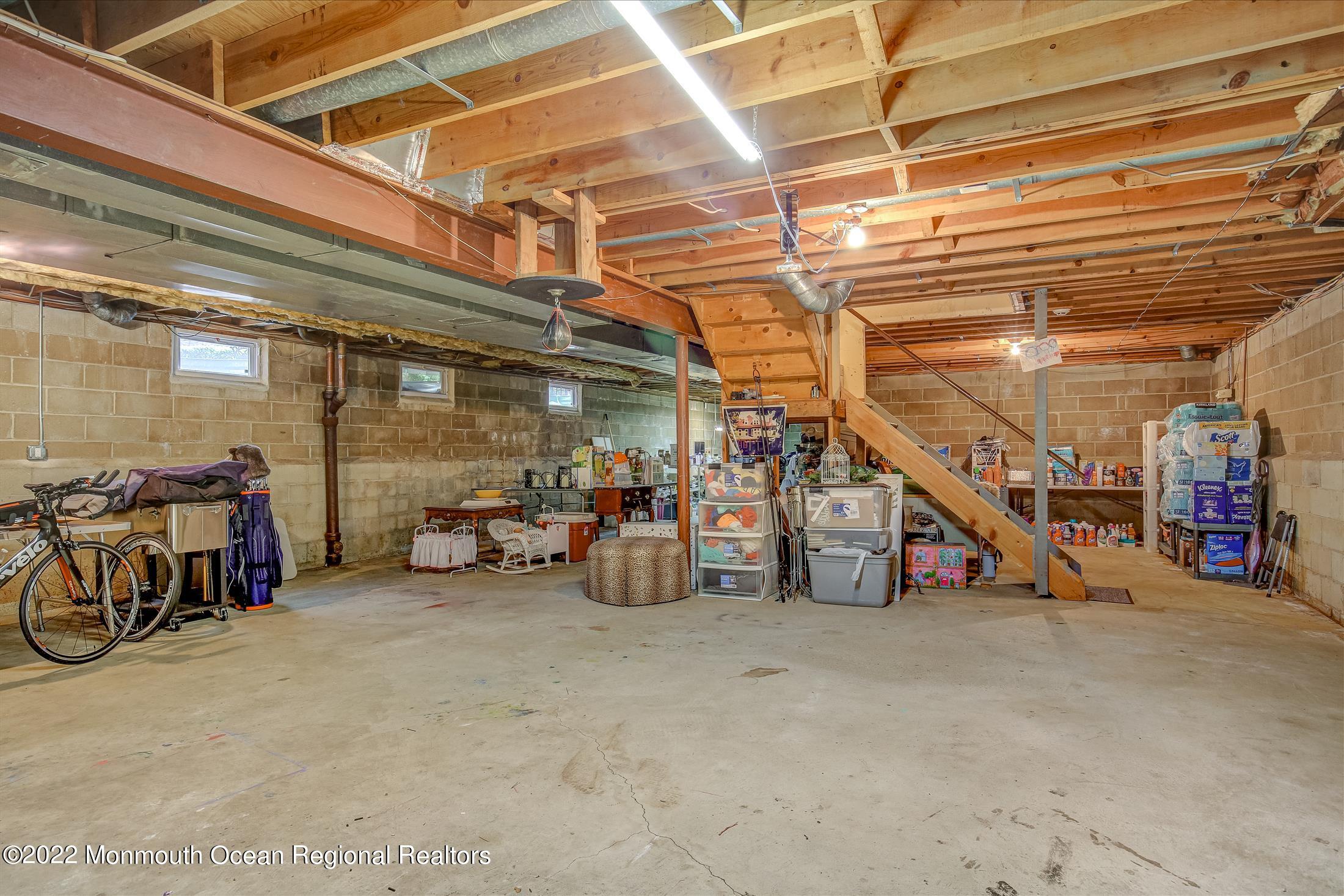 45 Ruby Drive Morganville, NJ 07751 - Photo 36 of 47 a view of a garage with parked cars