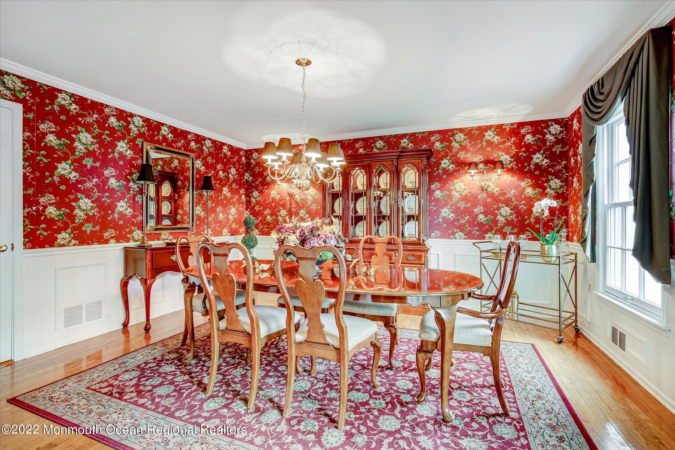 45 Ruby Drive Morganville, NJ 07751 - Photo 9 of 47 a dining room with furniture and a rug