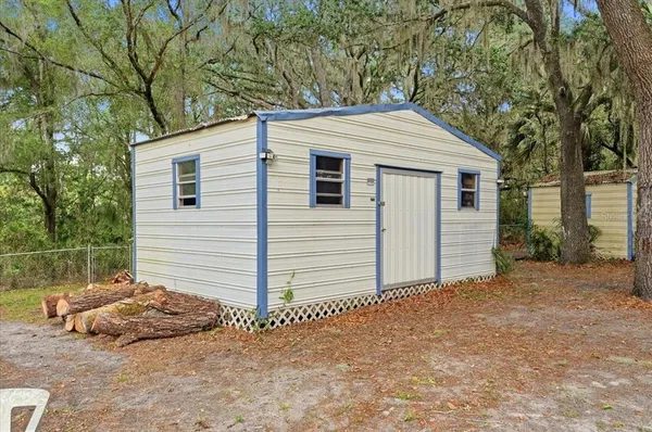 a view of a house with a street