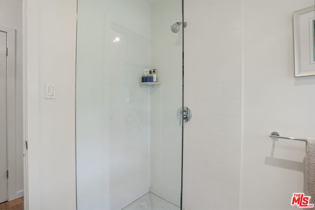 245 Tranquillo Road Pacific Palisades, CA 90272 - Photo 26 of 45 a bathroom with a shower