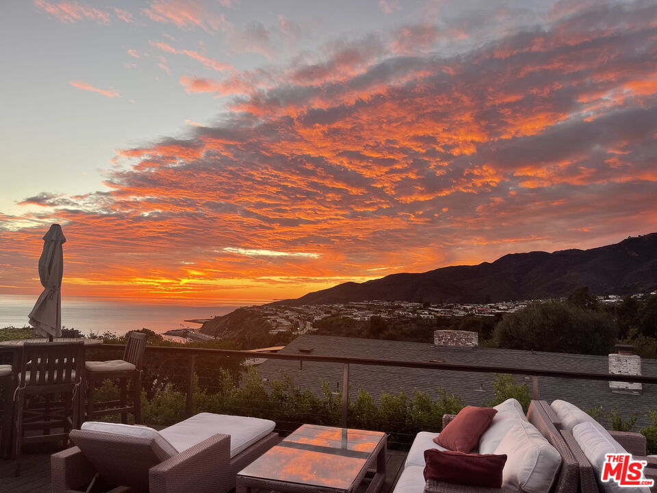 245 Tranquillo Road Pacific Palisades, CA 90272 - Photo 40 of 45 a view of couches and city view