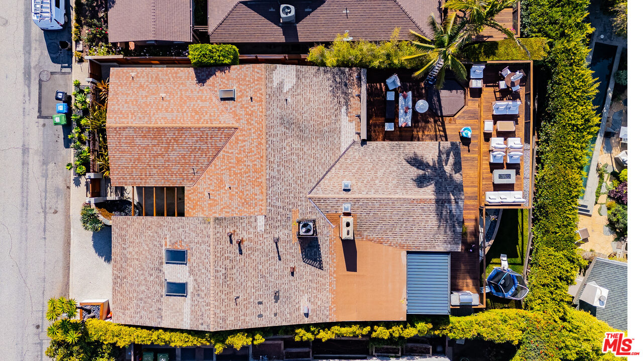 245 Tranquillo Road Pacific Palisades, CA 90272 - Photo 43 of 45 an aerial view of multiple houses with a yard