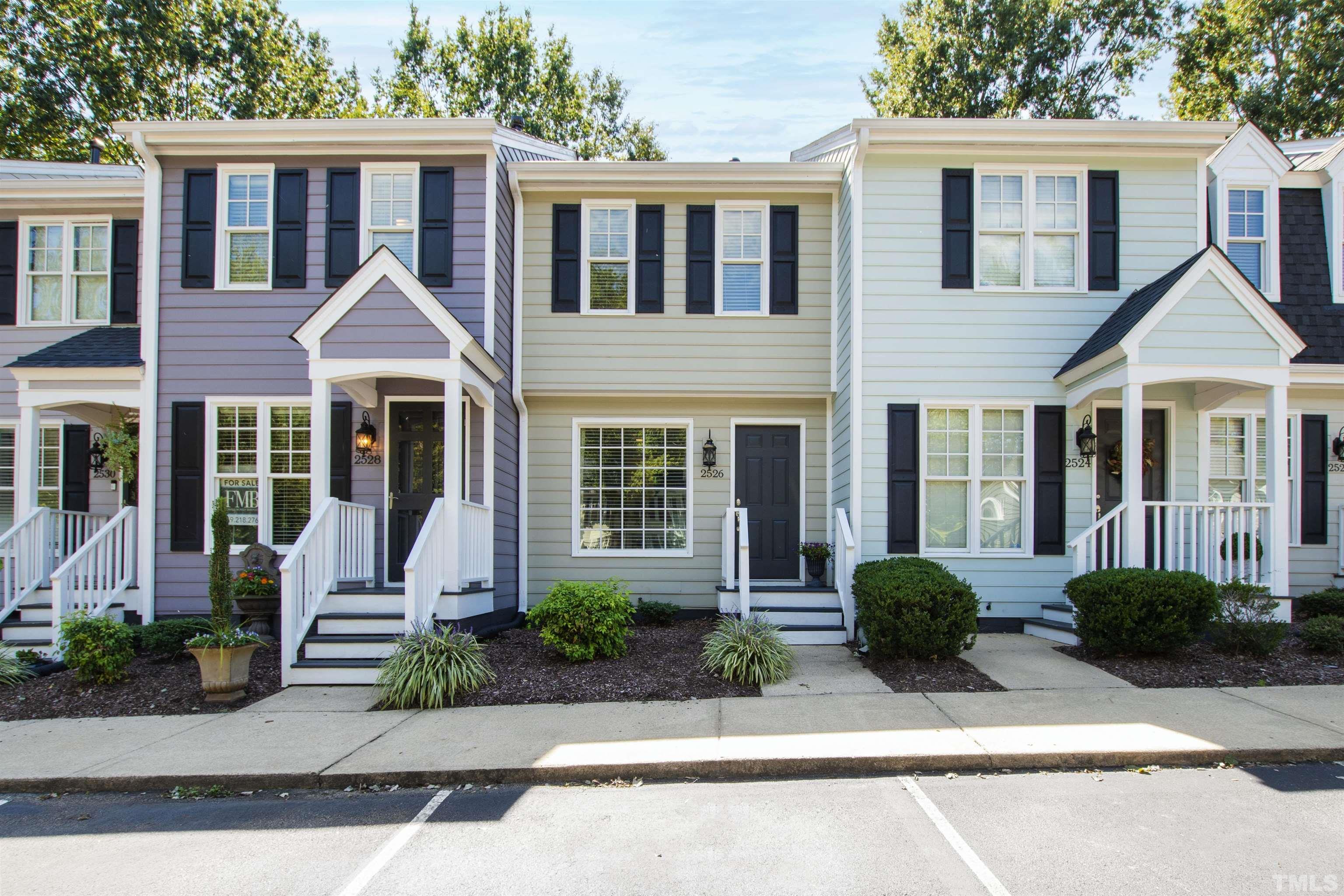 2526 Noble Road Raleigh, NC 27608 - Photo 1 of 27 a front view of a house with porch and glass windows