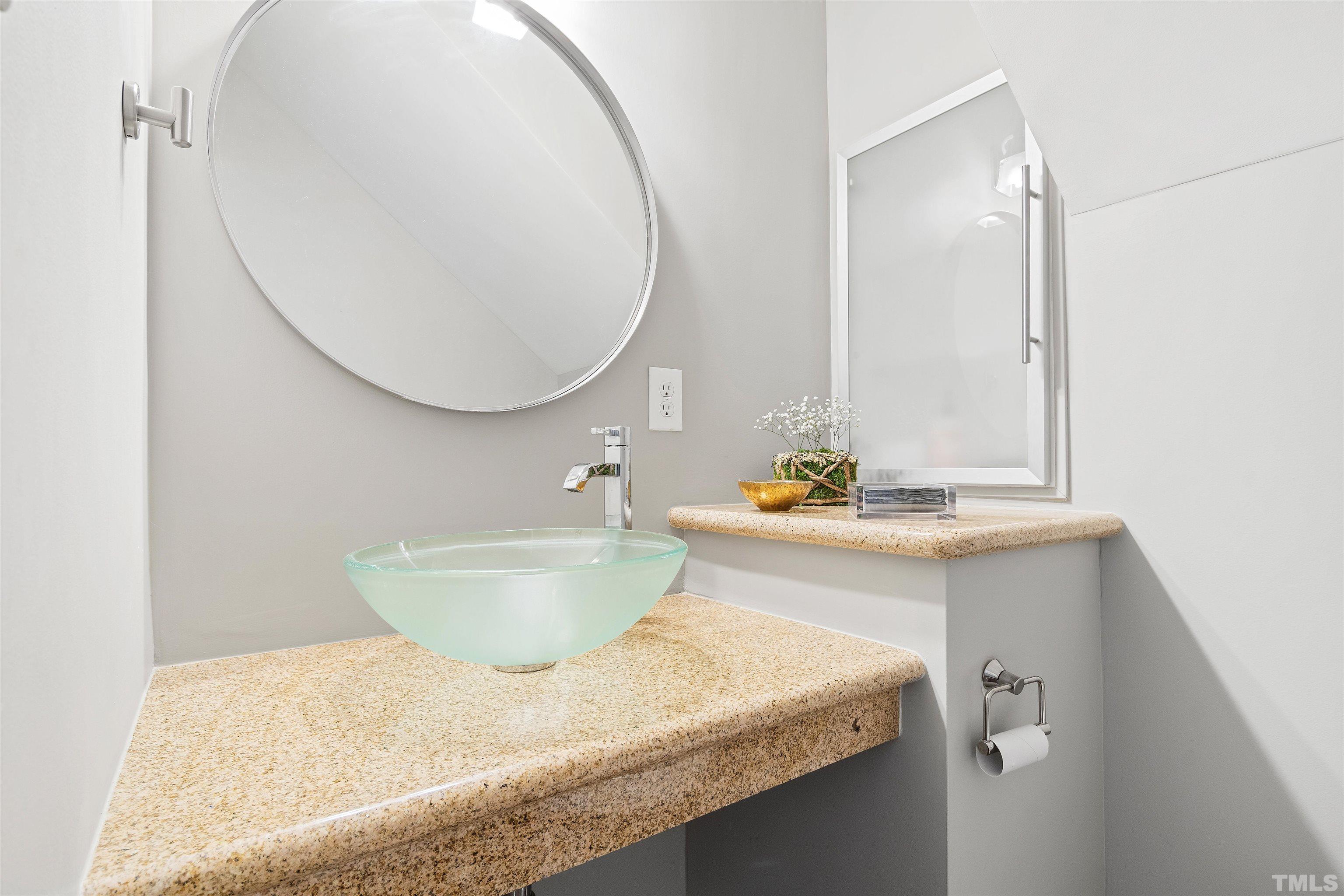 2526 Noble Road Raleigh, NC 27608 - Photo 15 of 27 a bathroom with a granite countertop sink and a mirror