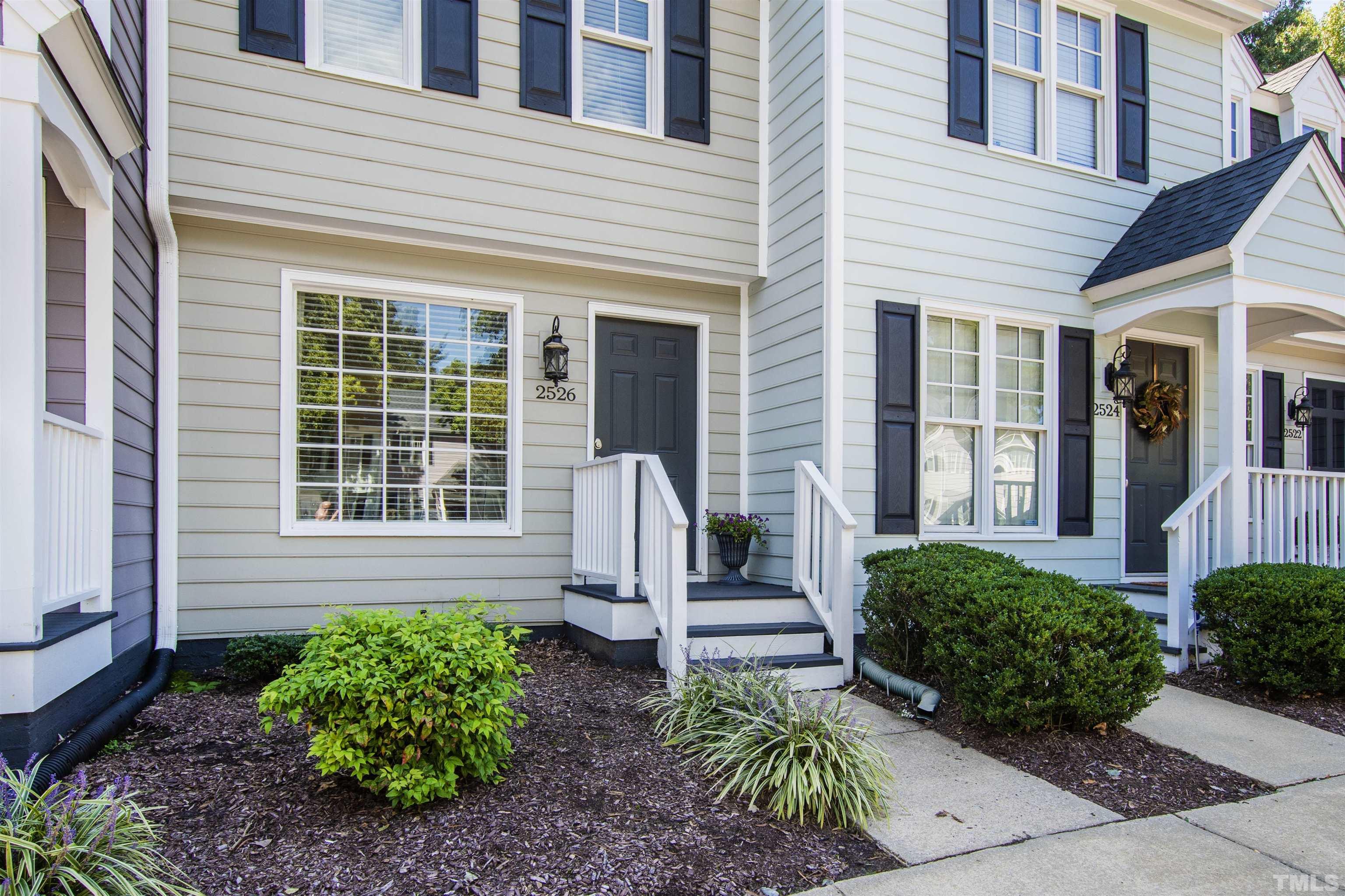 2526 Noble Road Raleigh, NC 27608 - Photo 2 of 27 a front view of a house with garden
