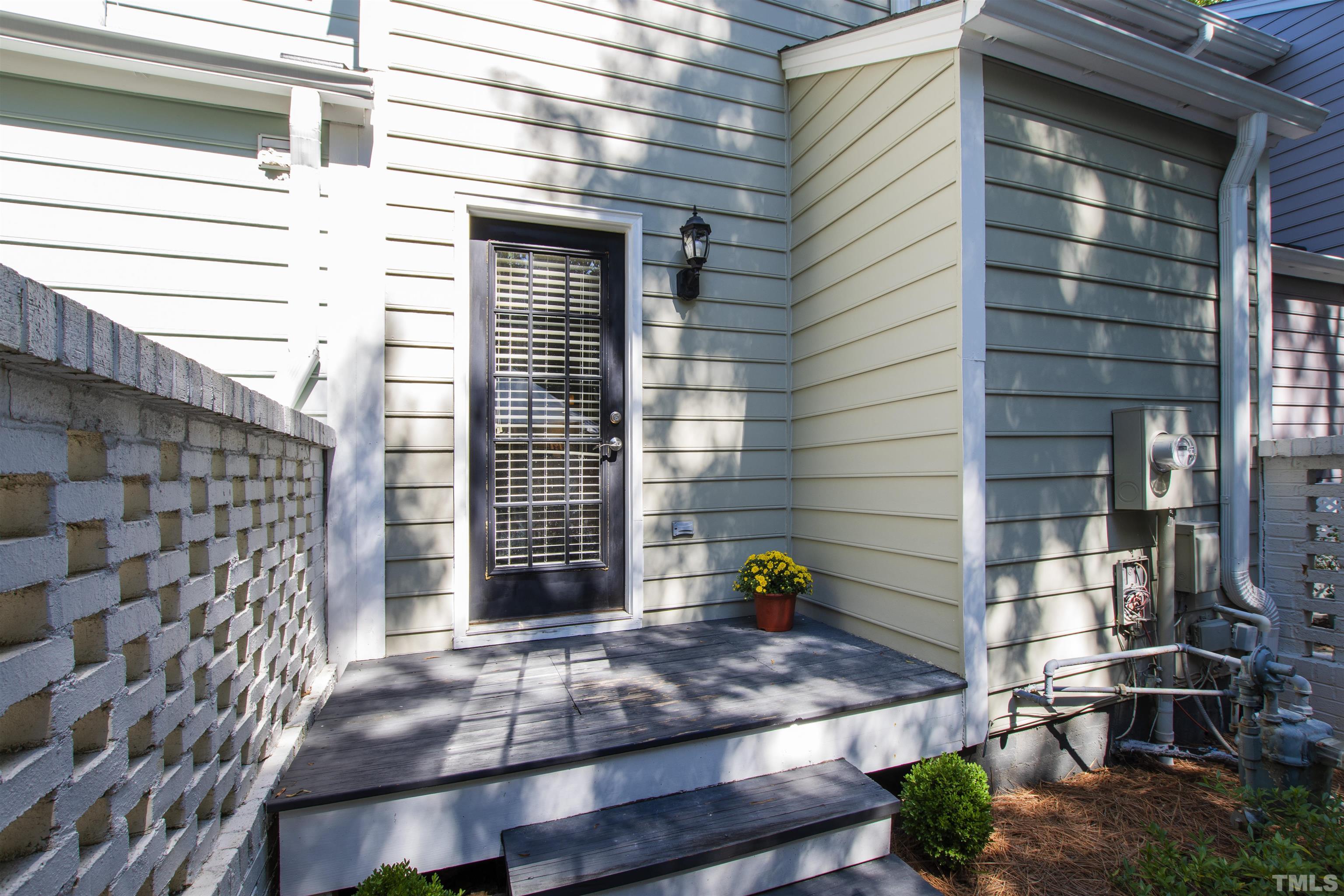 2526 Noble Road Raleigh, NC 27608 - Photo 24 of 27 a view of house with outdoor space