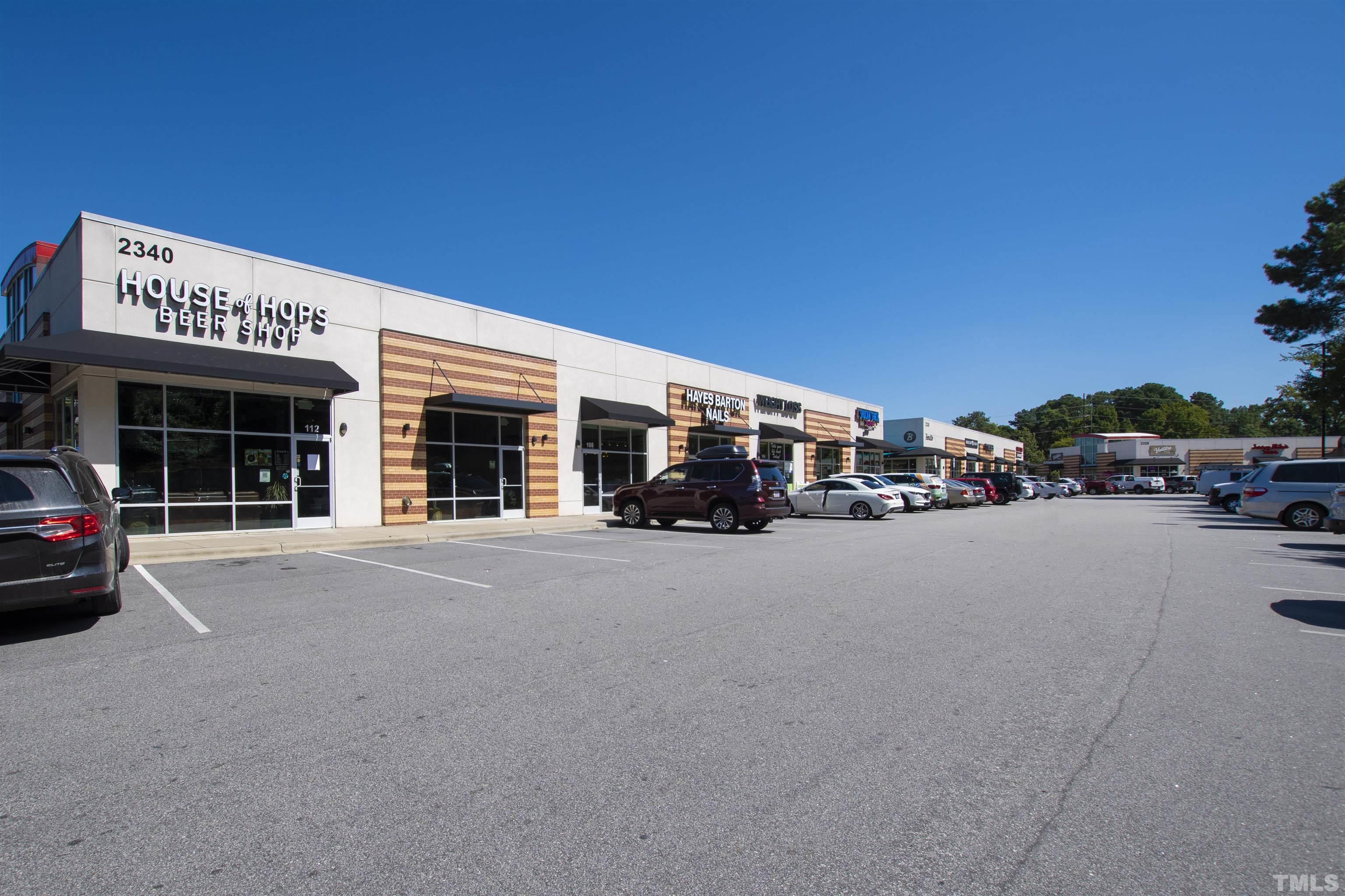 2526 Noble Road Raleigh, NC 27608 - Photo 27 of 27 a view of a car parked in front of a building
