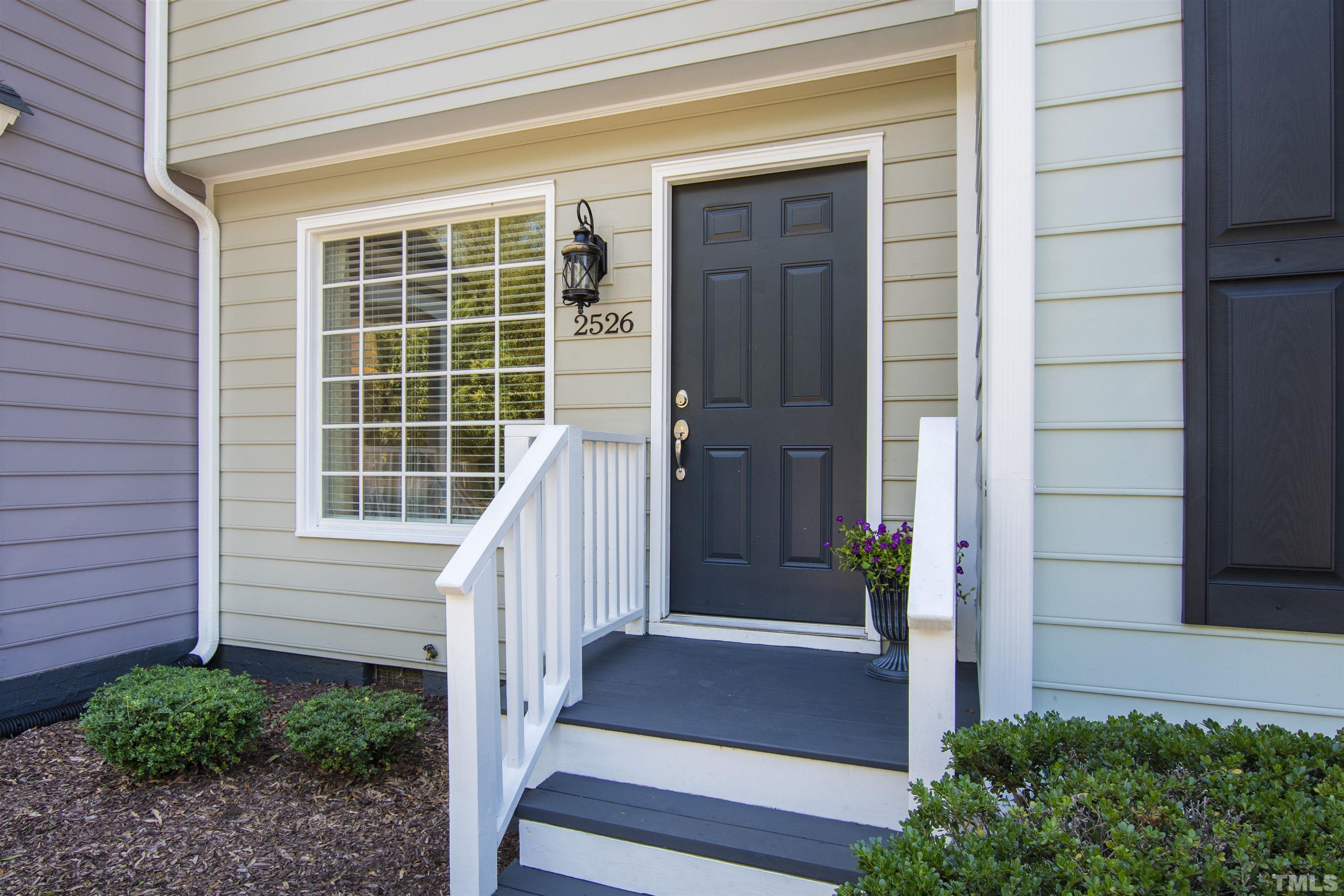 2526 Noble Road Raleigh, NC 27608 - Photo 3 of 27 a view of front door of house with stairs