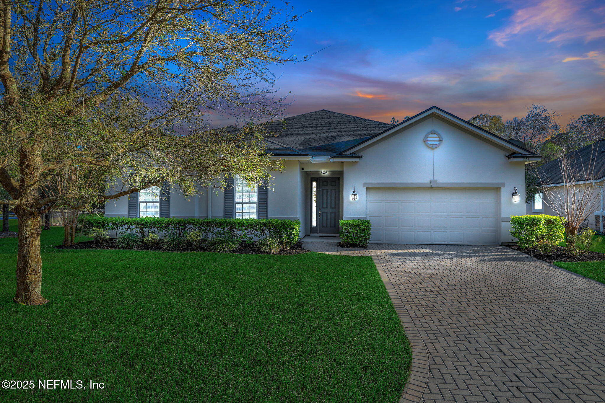 119 Duck Pond Drive St. Augustine, FL 32086 - Photo 1 of 56 a front view of a house with a yard and garage