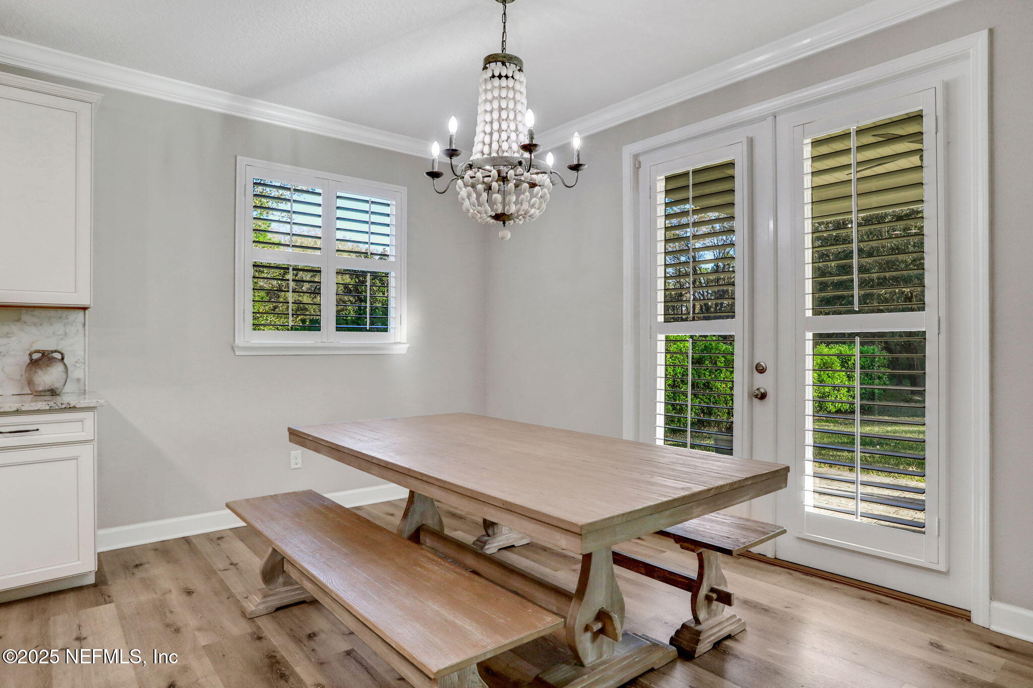 119 Duck Pond Drive St. Augustine, FL 32086 - Photo 18 of 56 a view of a workspace with furniture and a window