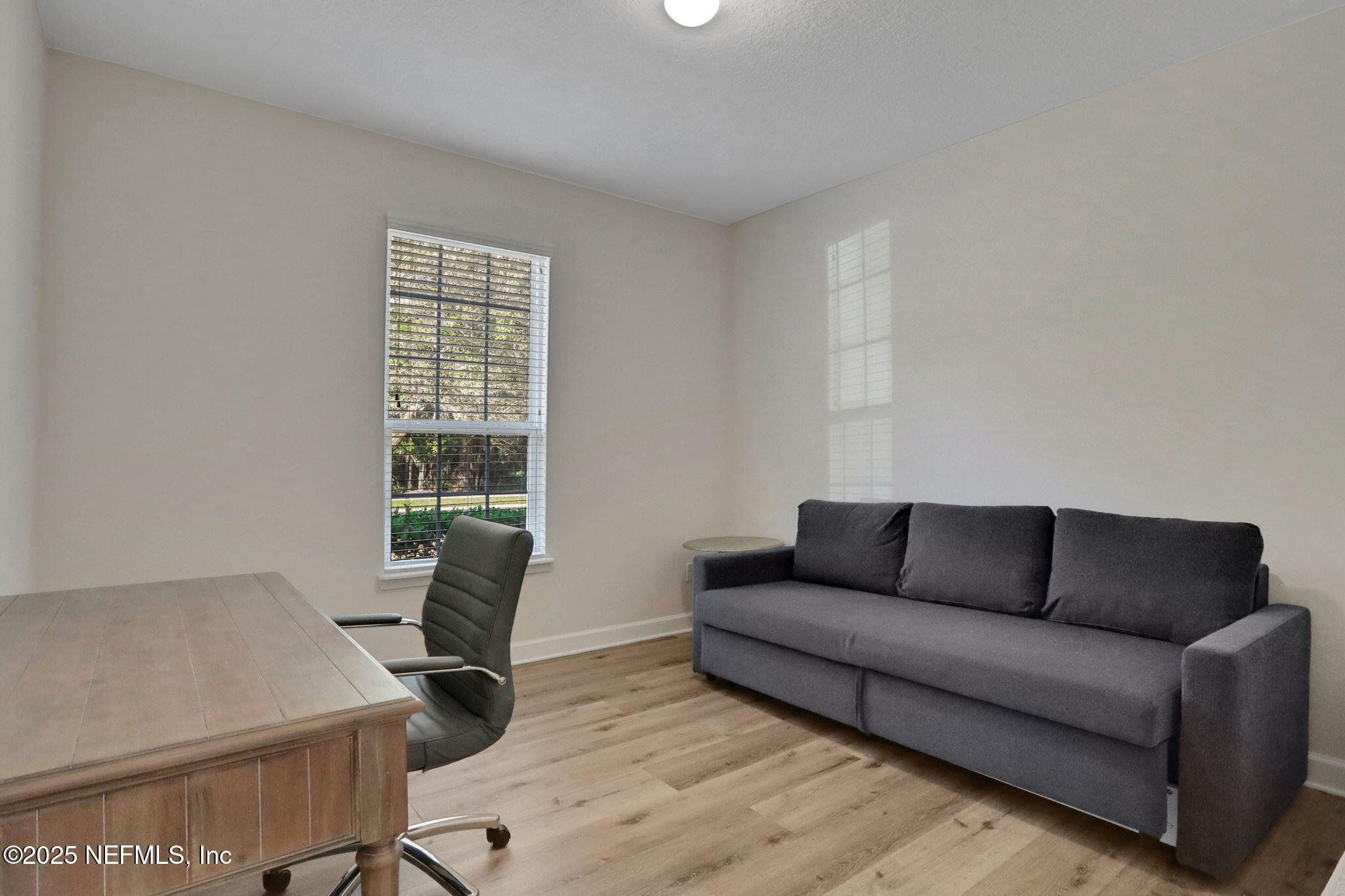 119 Duck Pond Drive St. Augustine, FL 32086 - Photo 36 of 56 a living room with furniture and a window