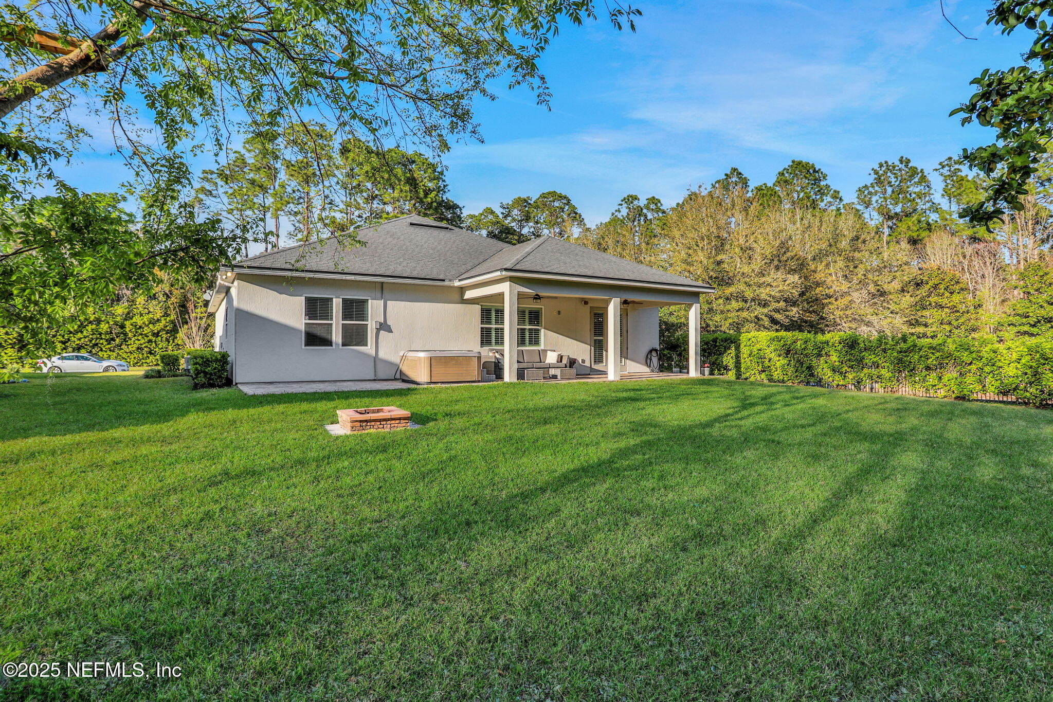 119 Duck Pond Drive St. Augustine, FL 32086 - Photo 44 of 56 a front view of house with yard and green space