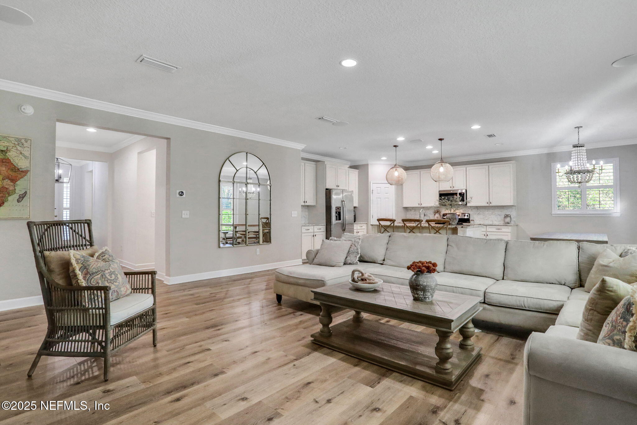 119 Duck Pond Drive St. Augustine, FL 32086 - Photo 7 of 56 a living room with furniture and a wooden floor